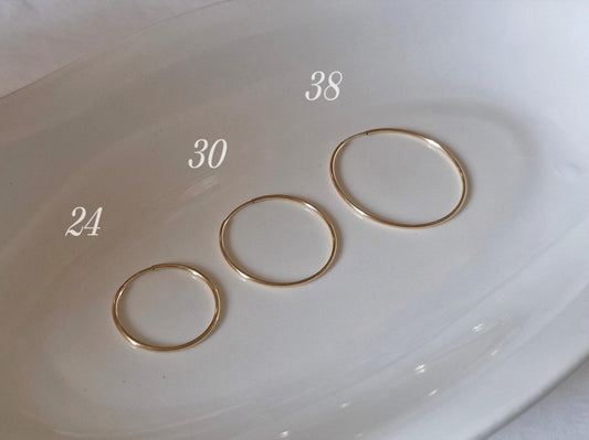 1.5mm gold filled hoop earring. lightweight pipe hoop earrings. endless hoop gold filled.