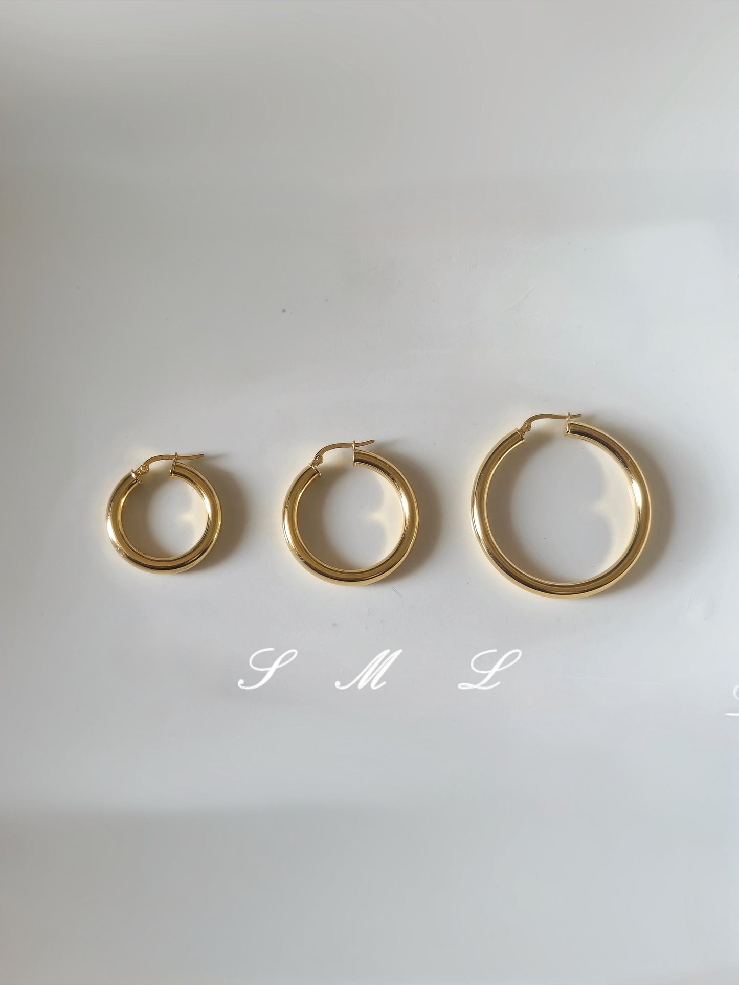 Bold chunky hoop earrings. Sterling silver hoop earrings.