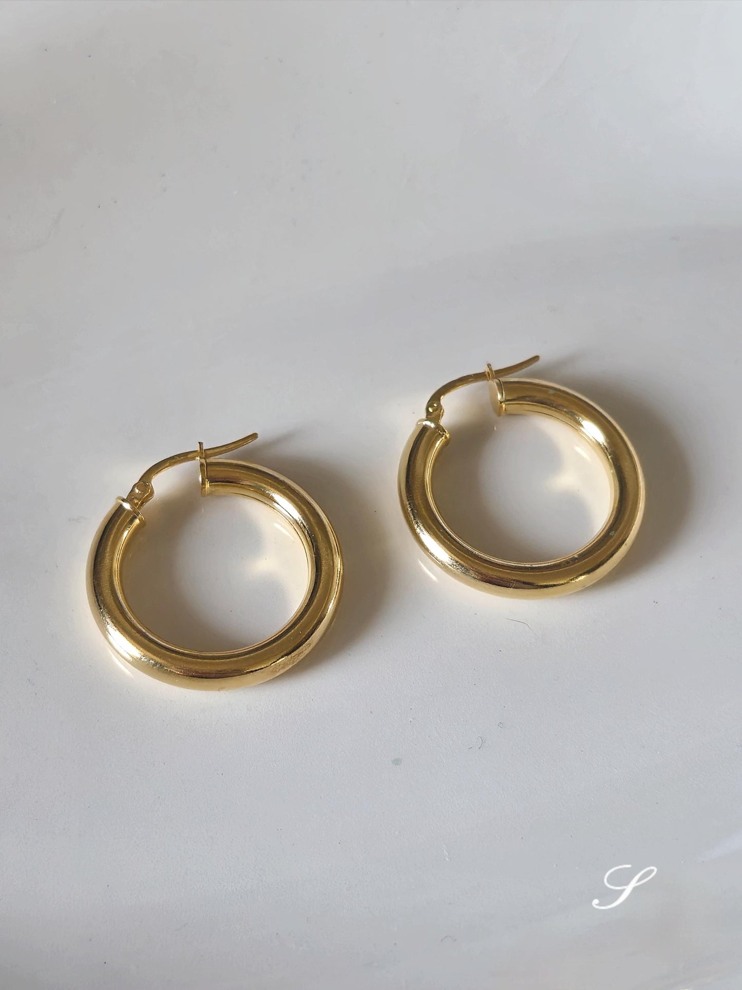 Bold chunky hoop earrings. Sterling silver hoop earrings.