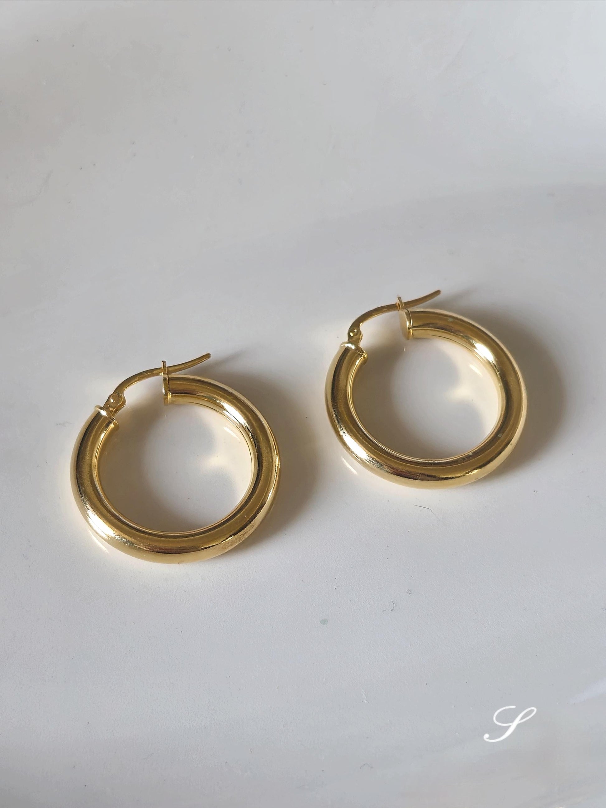 Bold chunky hoop earrings. Sterling silver hoop earrings.