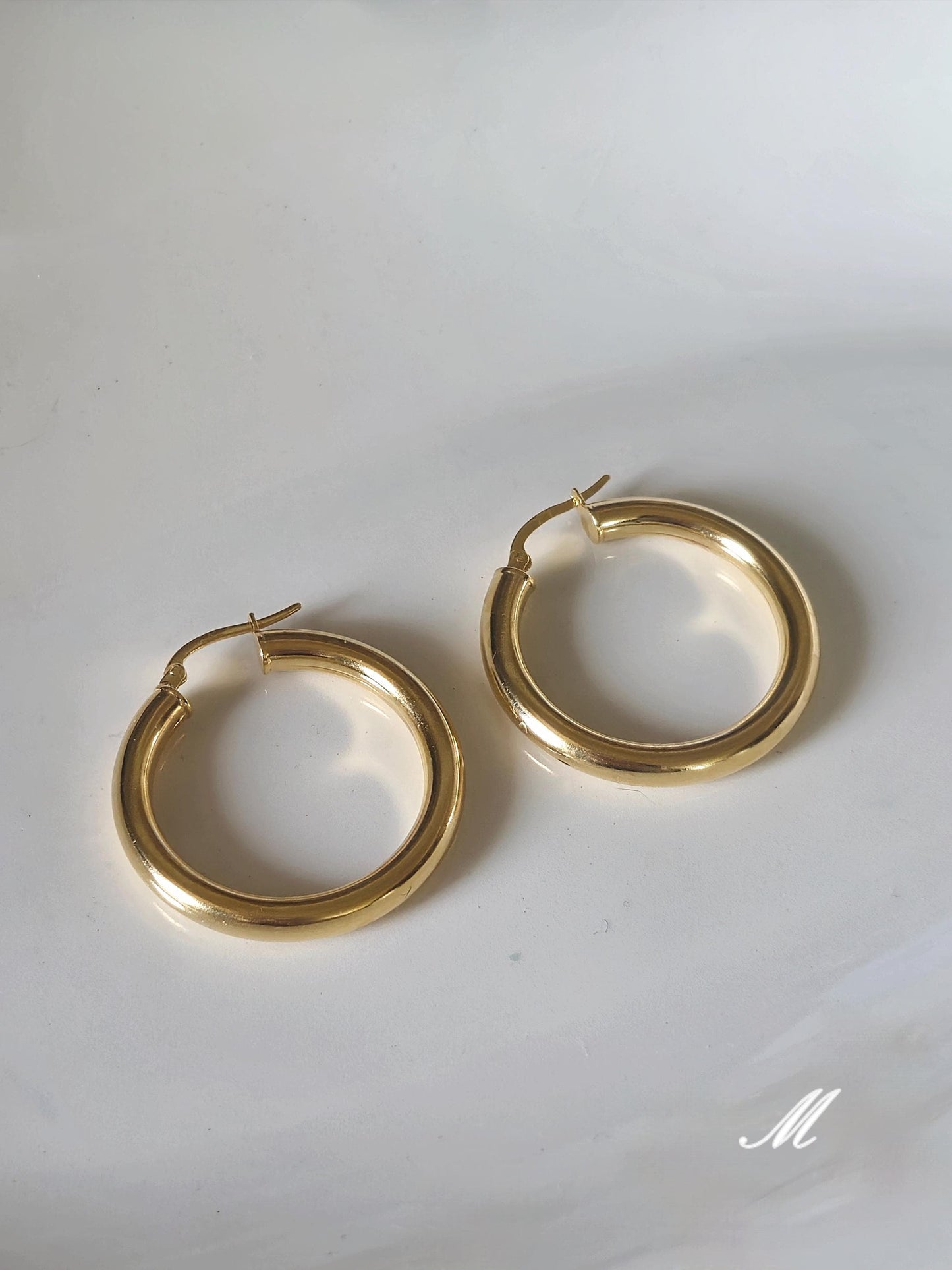 Bold chunky hoop earrings. Sterling silver hoop earrings.
