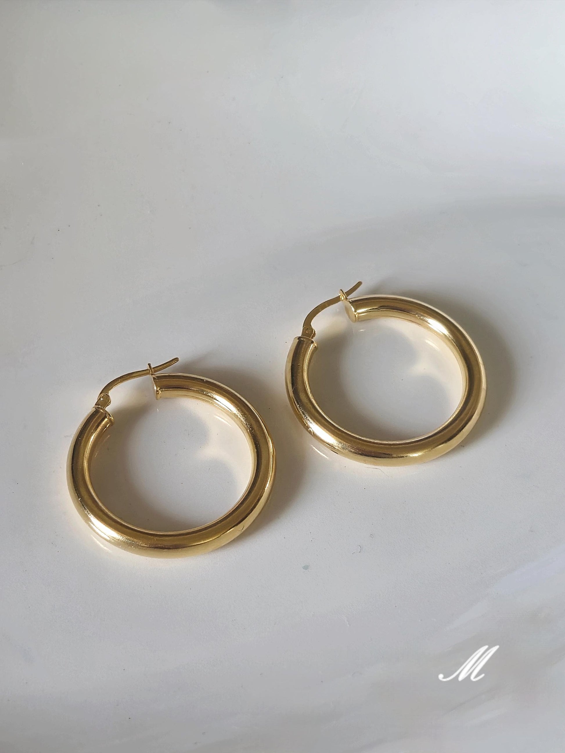 Bold chunky hoop earrings. Sterling silver hoop earrings.