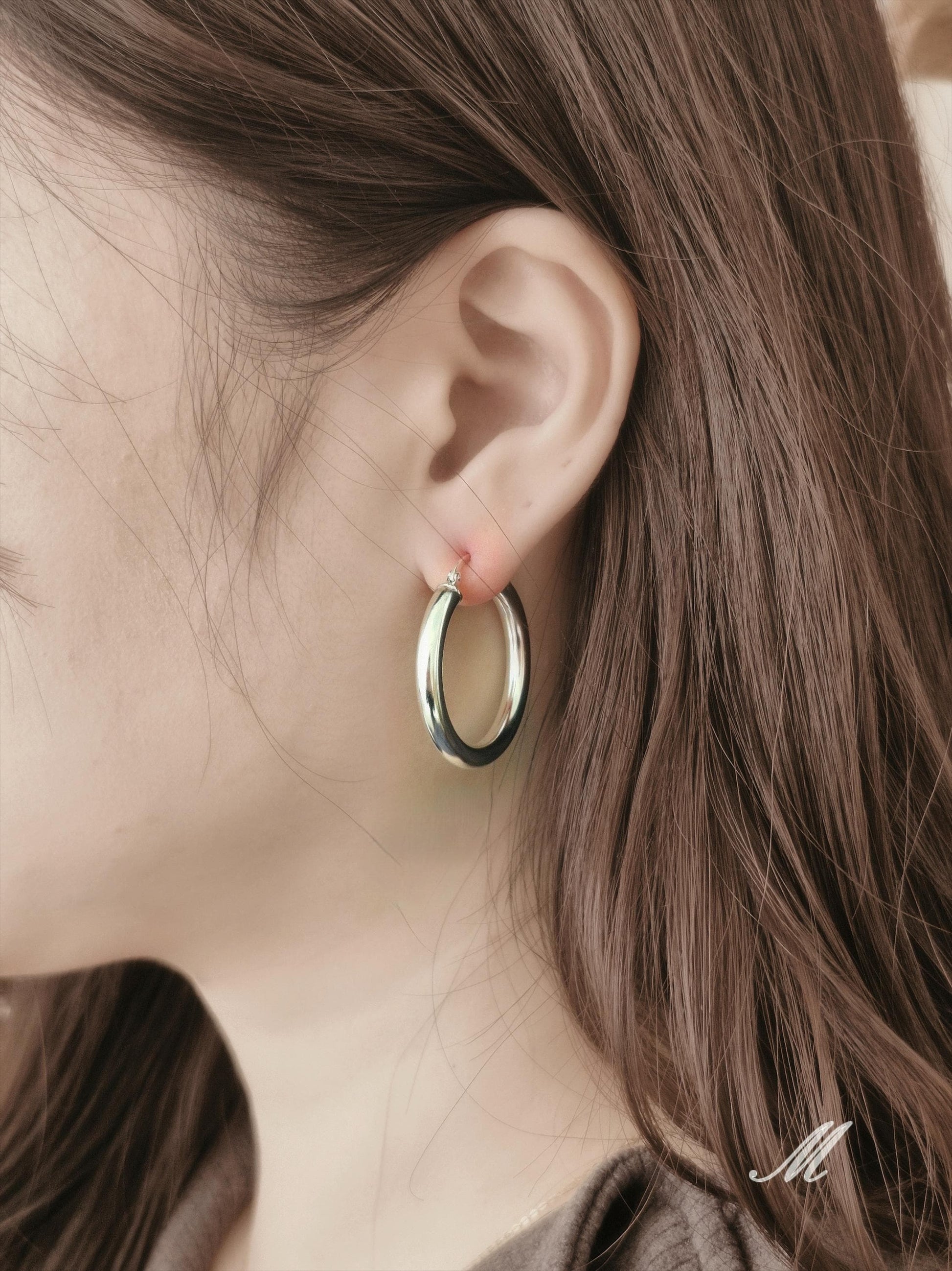 Bold chunky hoop earrings. Sterling silver hoop earrings.