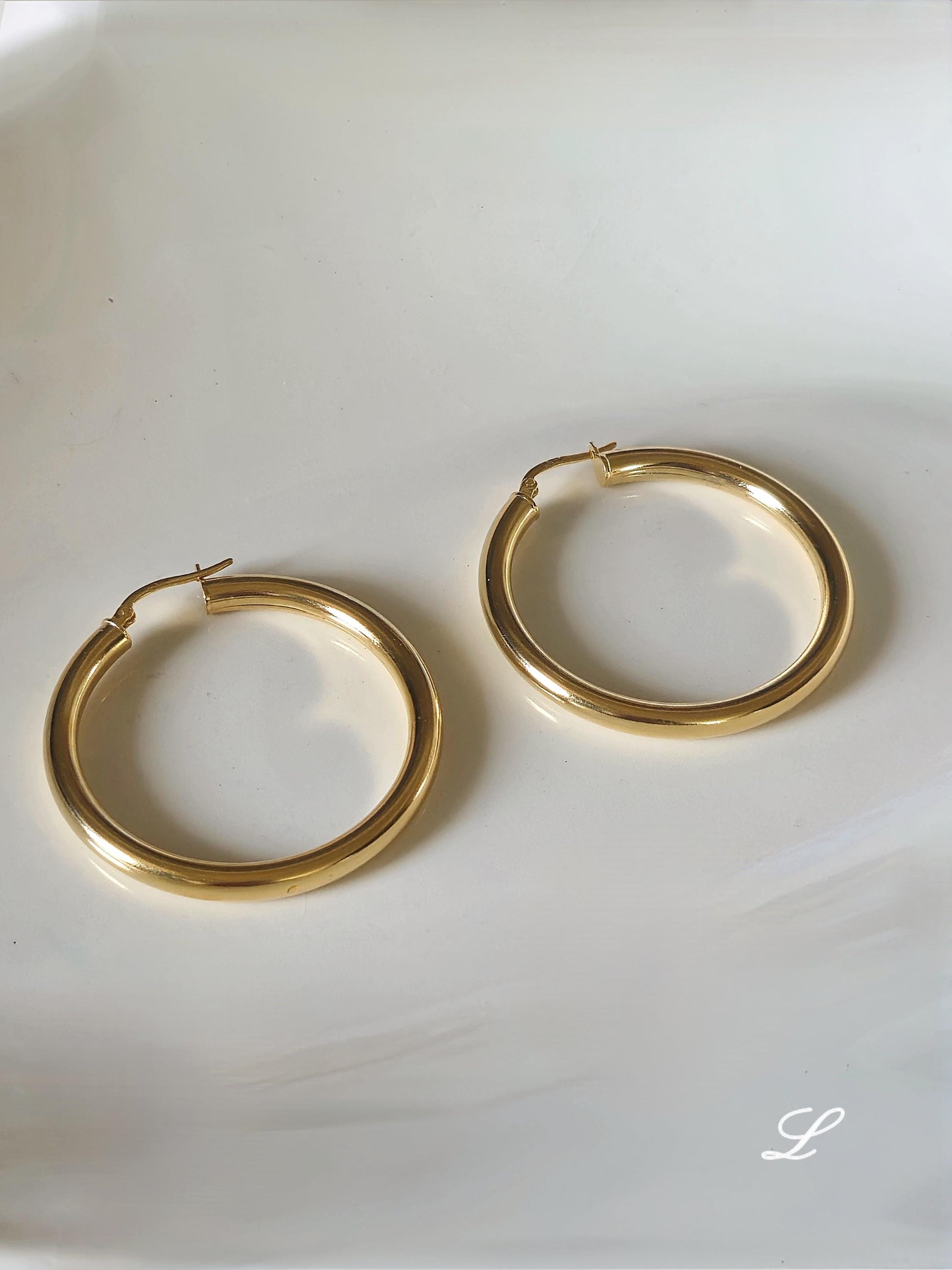 Bold chunky hoop earrings. Sterling silver hoop earrings.