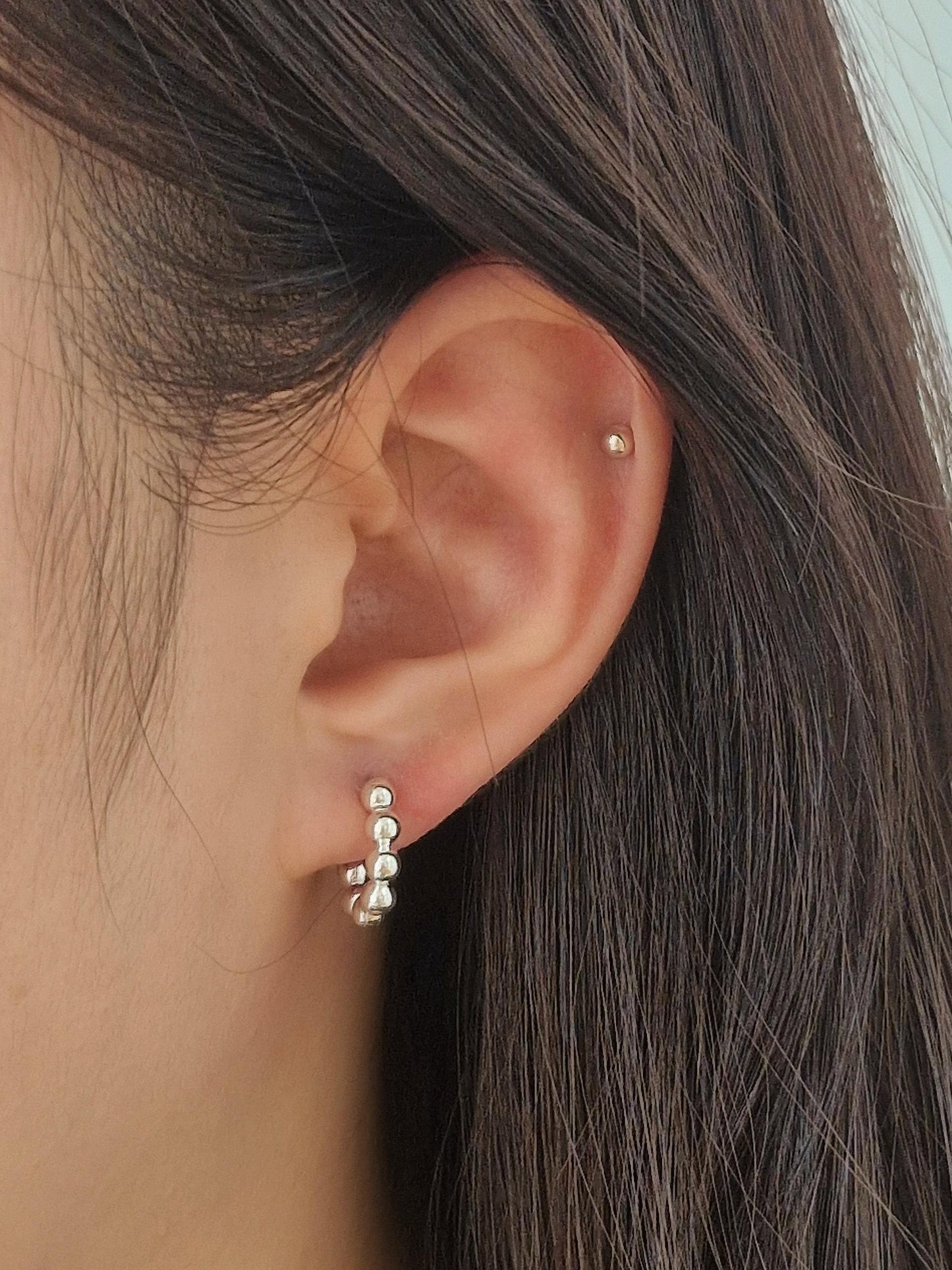 Bubble earrings. Basic hoop ball plain huggie earrings simple and chic. modernist design. clicker.