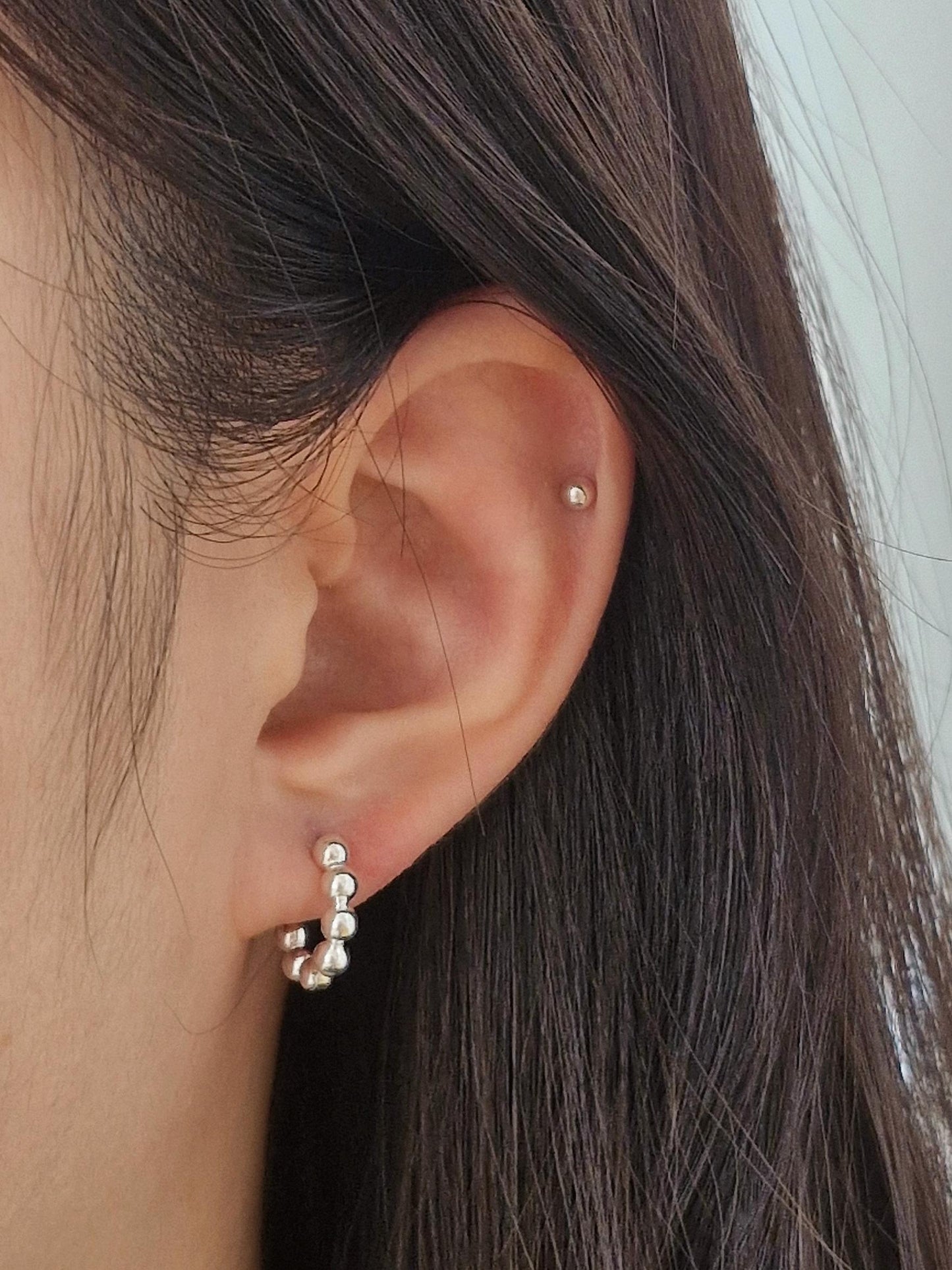 Bubble earrings. Basic hoop ball plain huggie earrings simple and chic. modernist design. clicker.