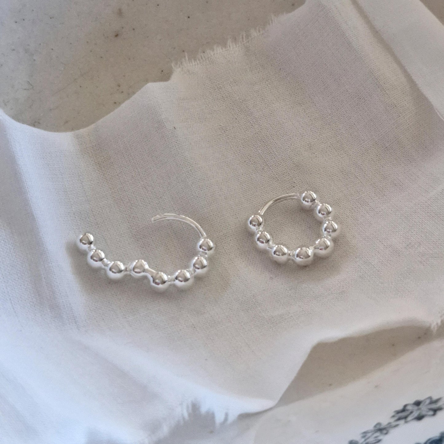 Bubble earrings. Basic hoop ball plain huggie earrings simple and chic. modernist design. clicker.