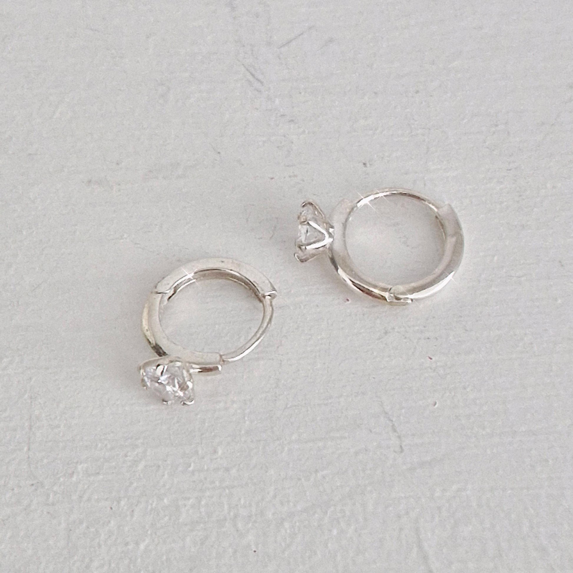 Classic Solitaire Hoop Earrings. solitaire cubic huggie earrings. 925 silver earrings. Hinged CZ Clicker Hoop