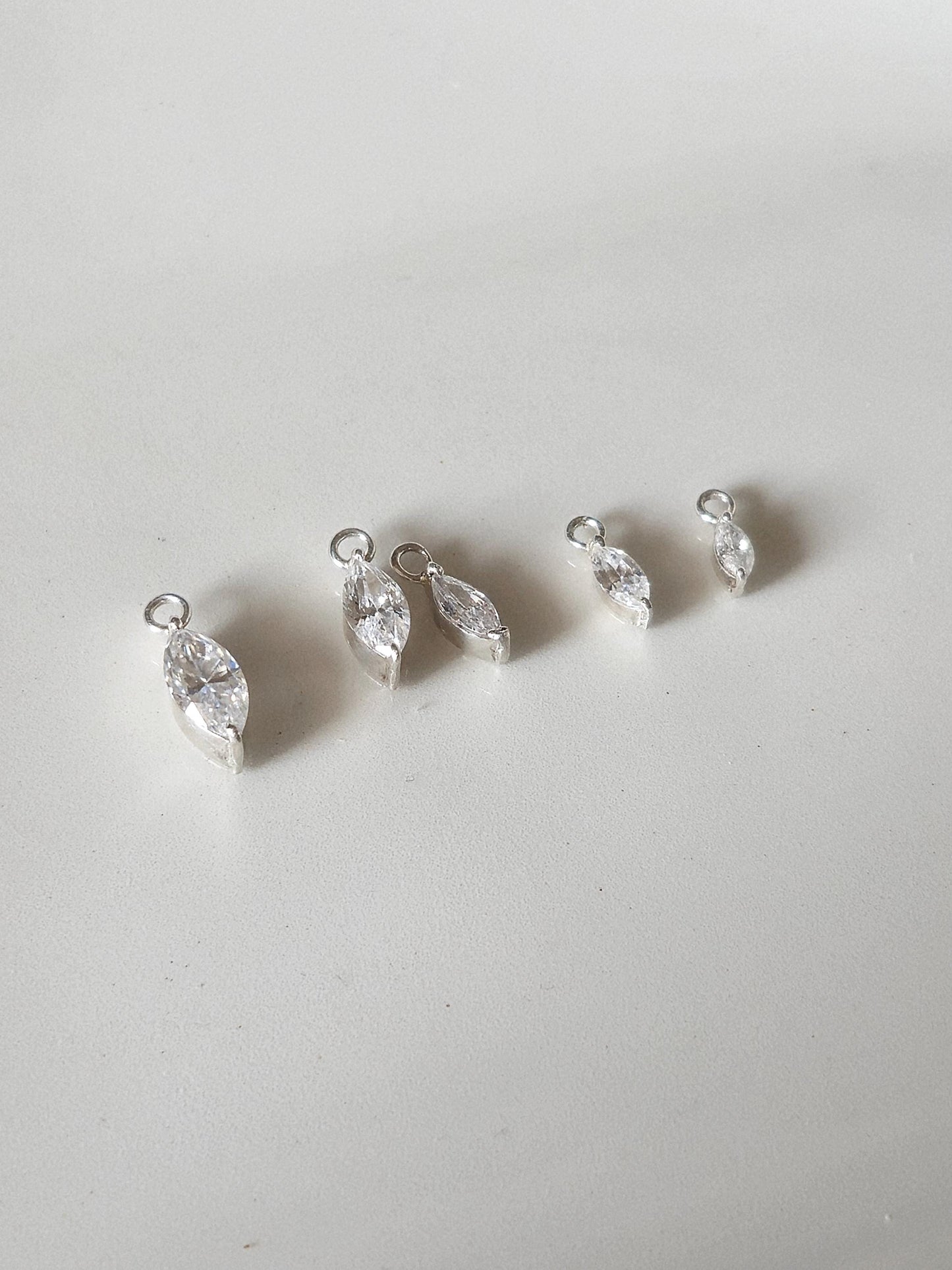Marquise cut Moissanite Lab diamond Sterling silver hoop. (Sold as single piece)
