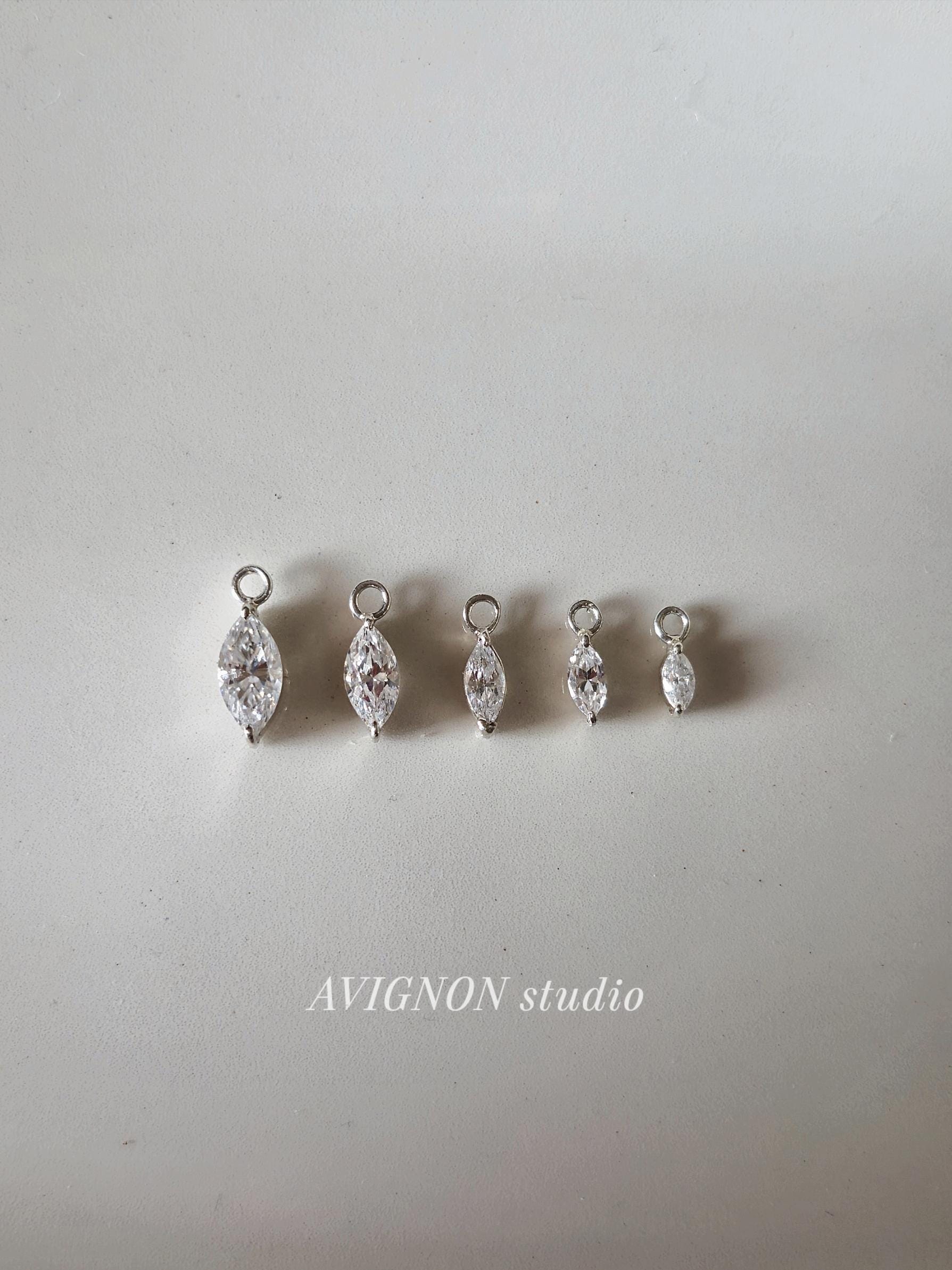 Marquise cut Moissanite Lab diamond Sterling silver hoop. (Sold as single piece)