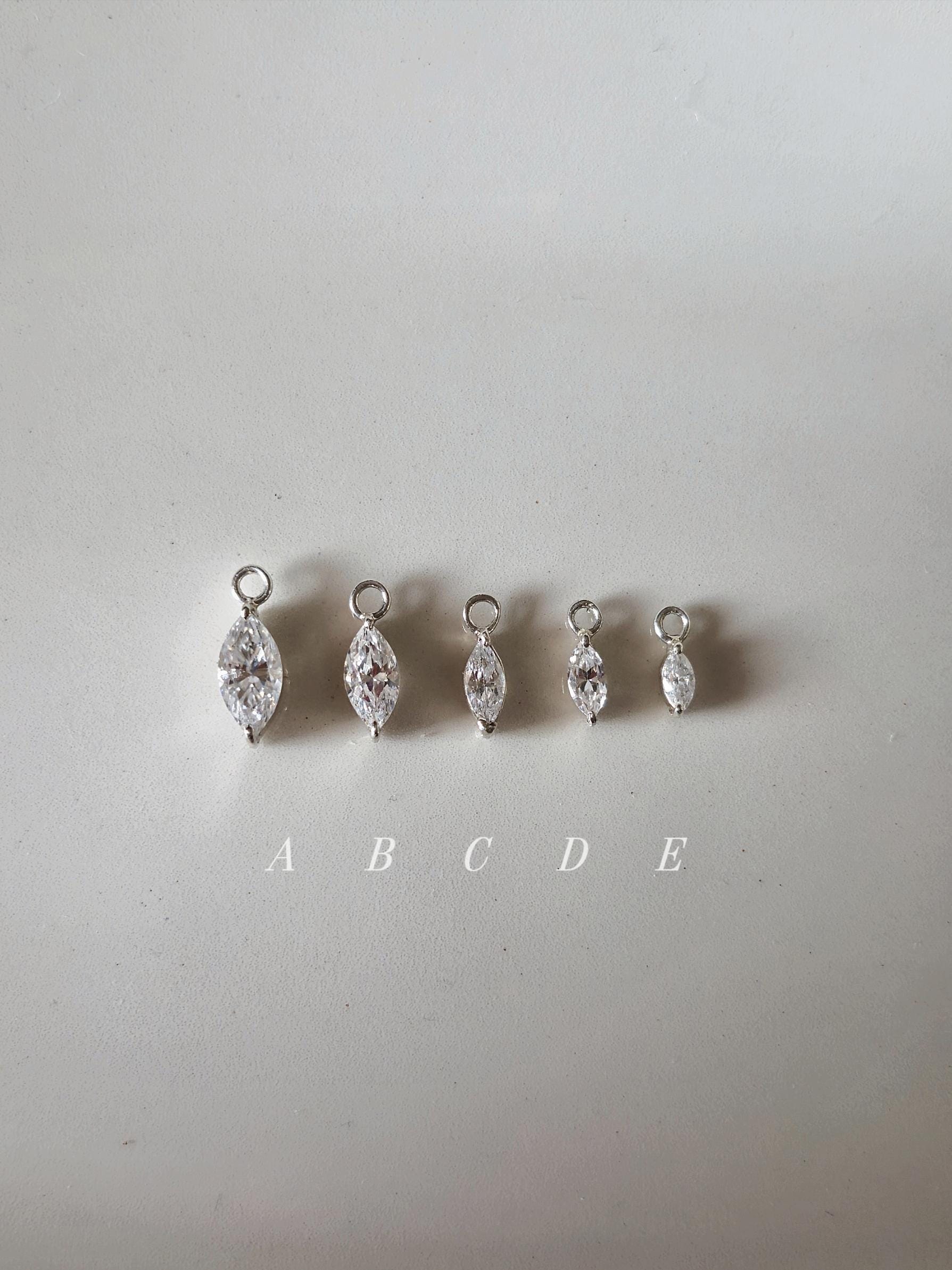 Marquise cut Moissanite Lab diamond Sterling silver hoop. (Sold as single piece)