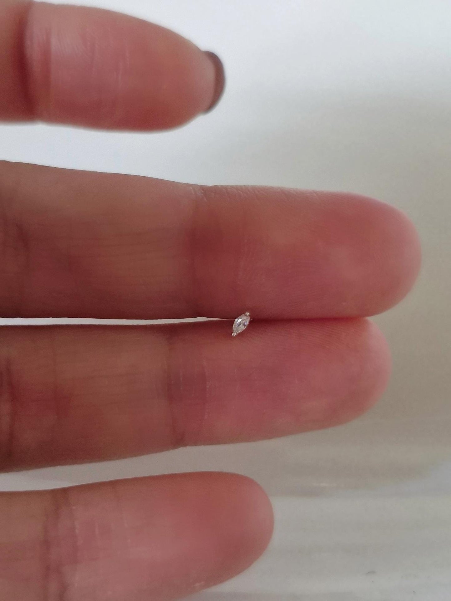 Marquise cz sterling silver piercing. tiny silver piercing.
