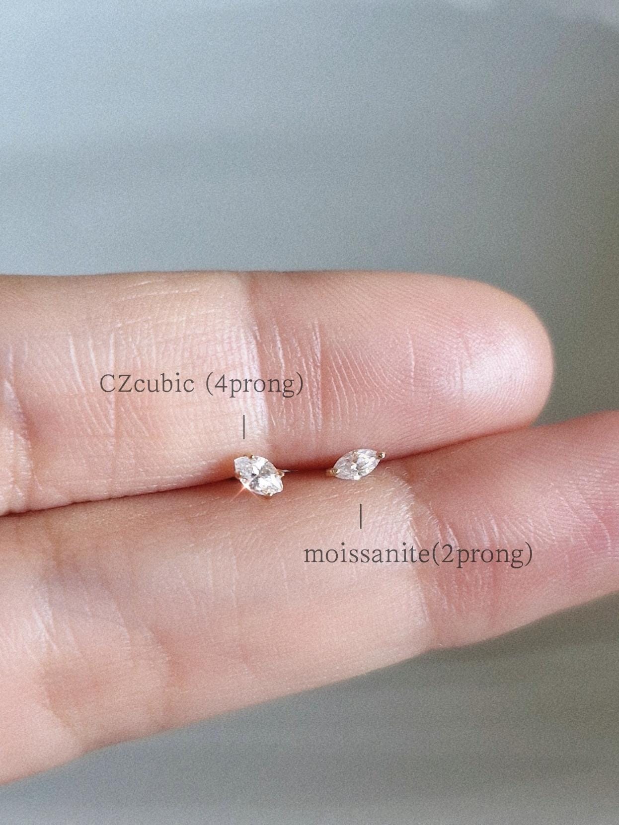 Marquise moissanite cz piercing. Tiny 14k solid gold piercing. Oval 14k piercing.