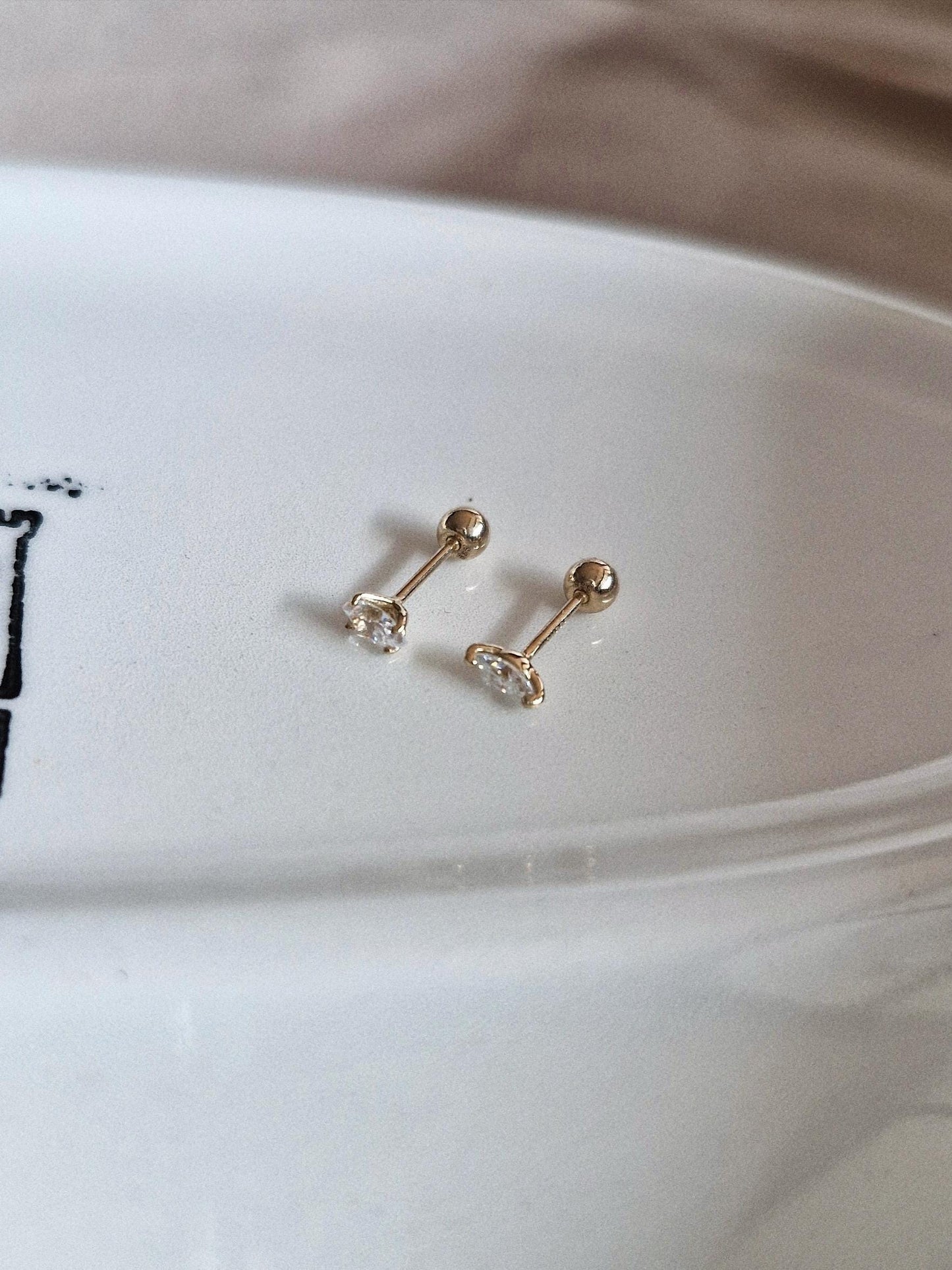 Marquise moissanite cz piercing. Tiny 14k solid gold piercing. Oval 14k piercing.