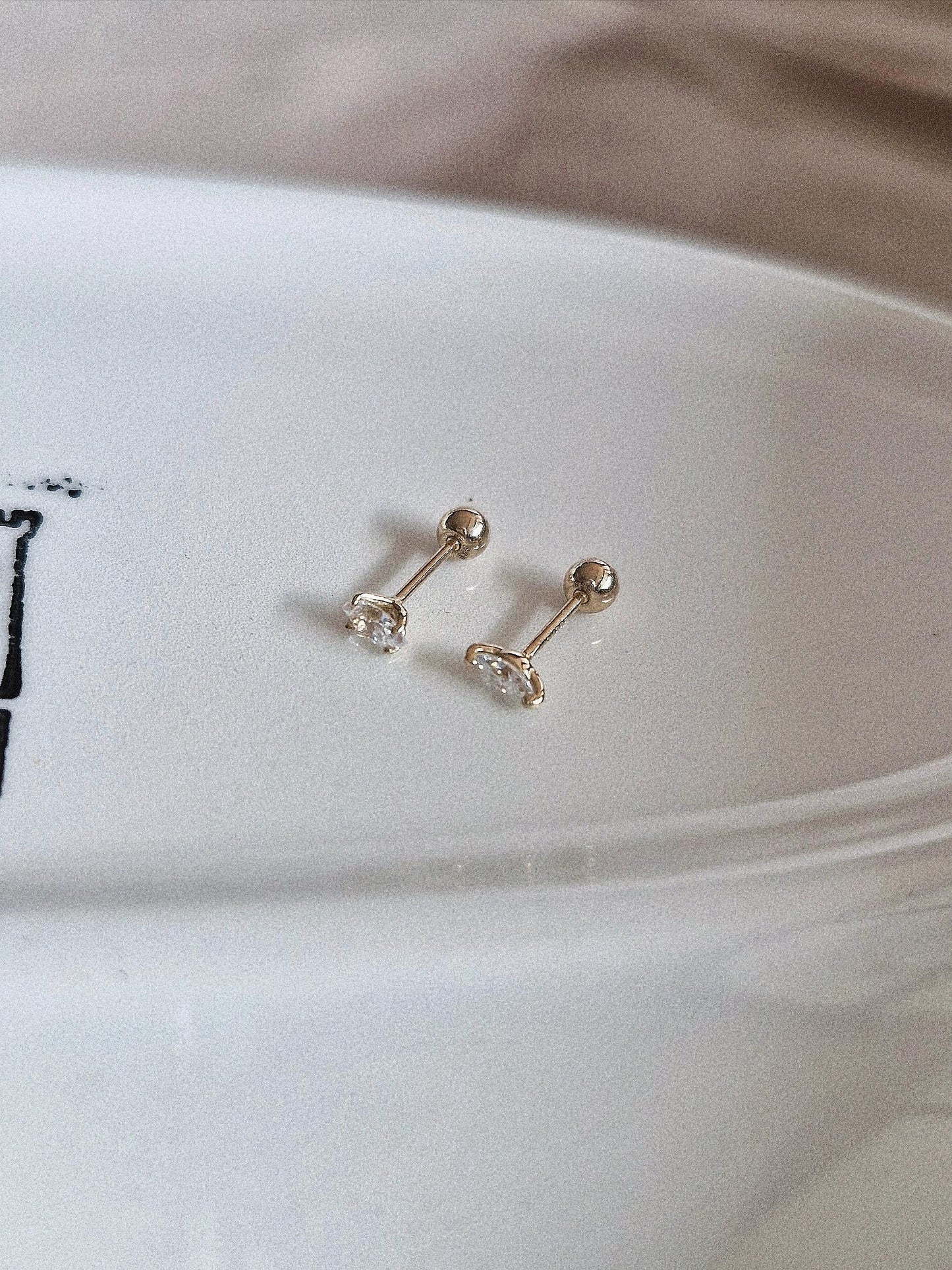 Marquise moissanite cz piercing. Tiny 14k solid gold piercing. Oval 14k piercing.