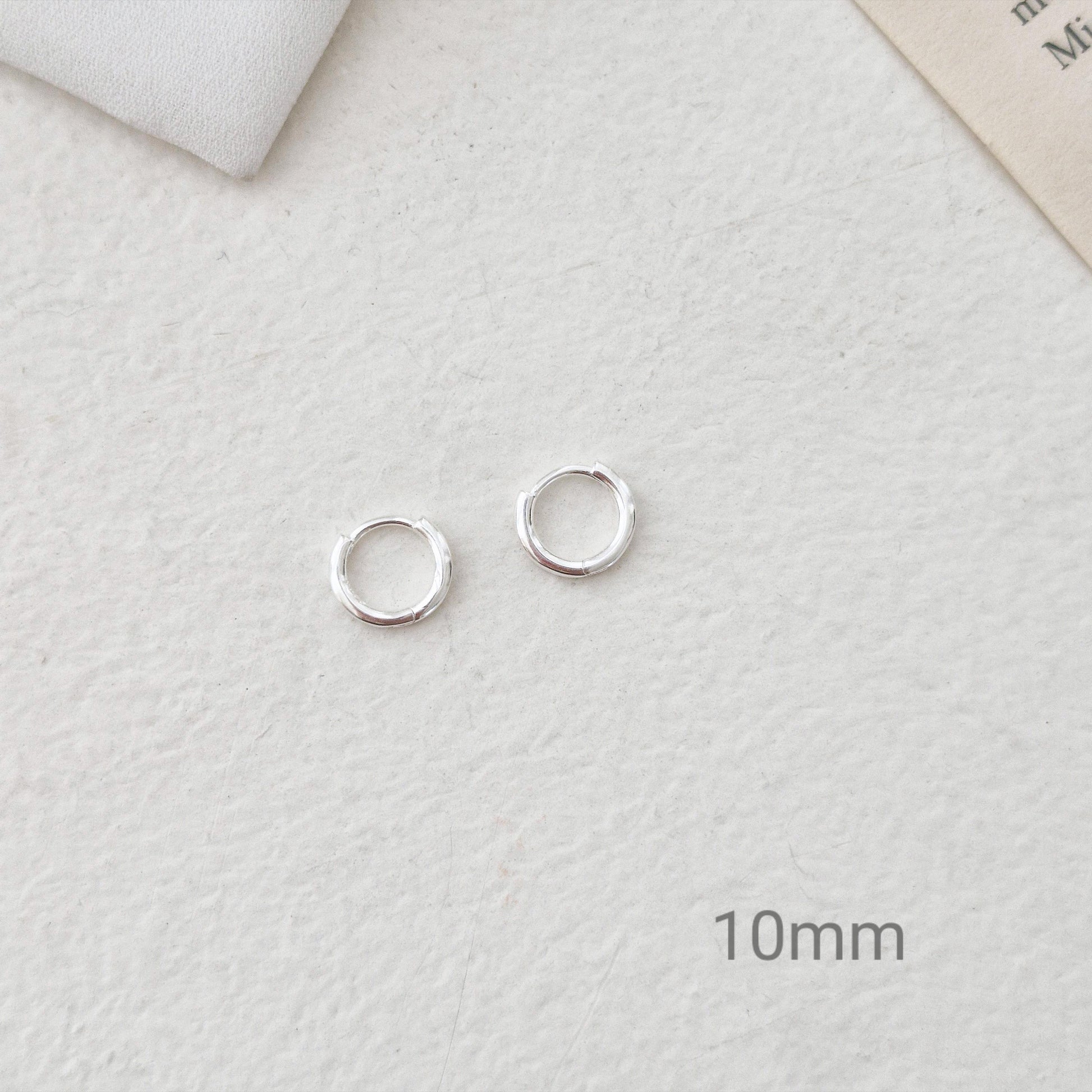 Sterling Silver 925 Earrings (10mm / 12mm / 15mm). dainty hoop huggie earring. modernist. Hinged clicker. 1.5mm hoop earrings.