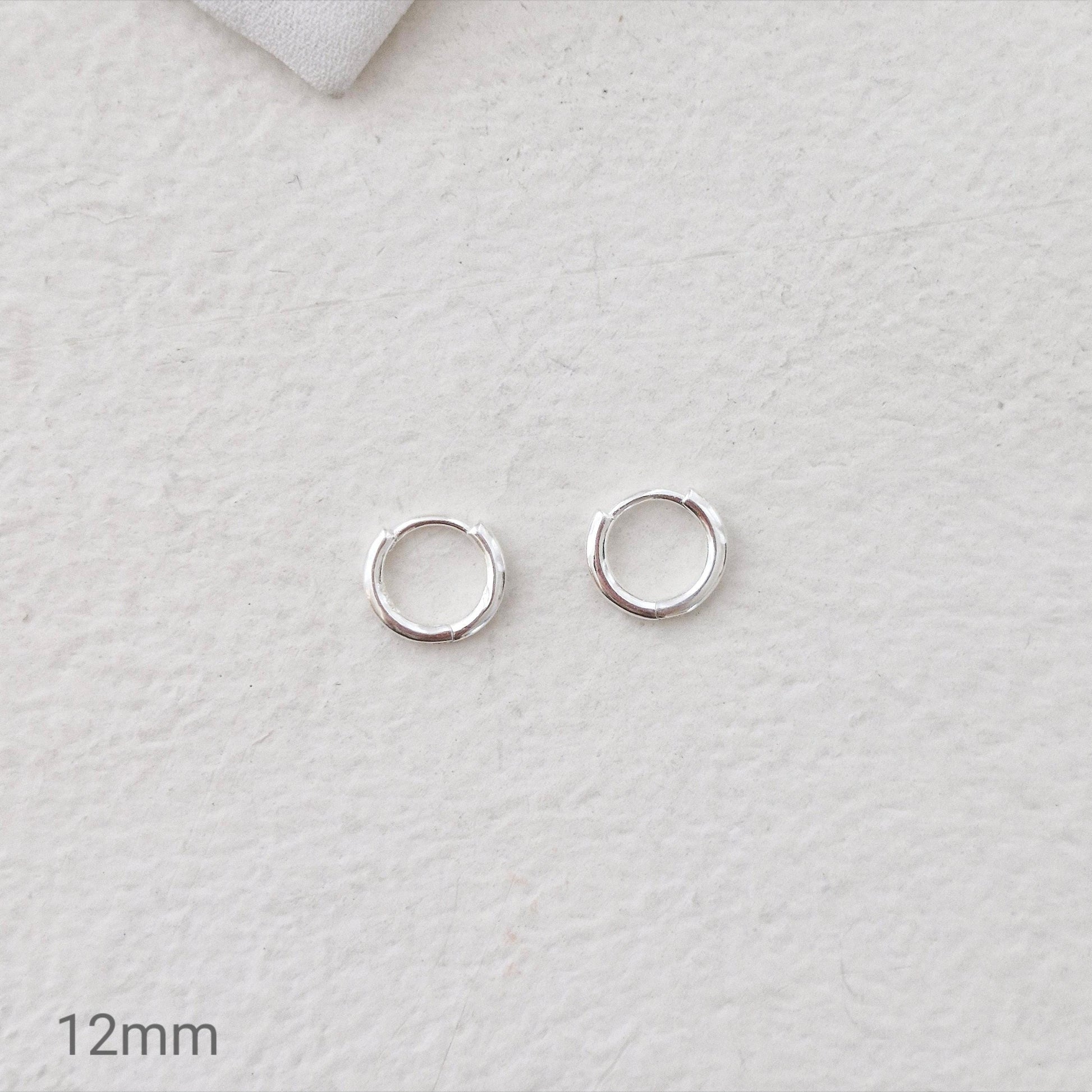 Sterling Silver 925 Earrings (10mm / 12mm / 15mm). dainty hoop huggie earring. modernist. Hinged clicker. 1.5mm hoop earrings.