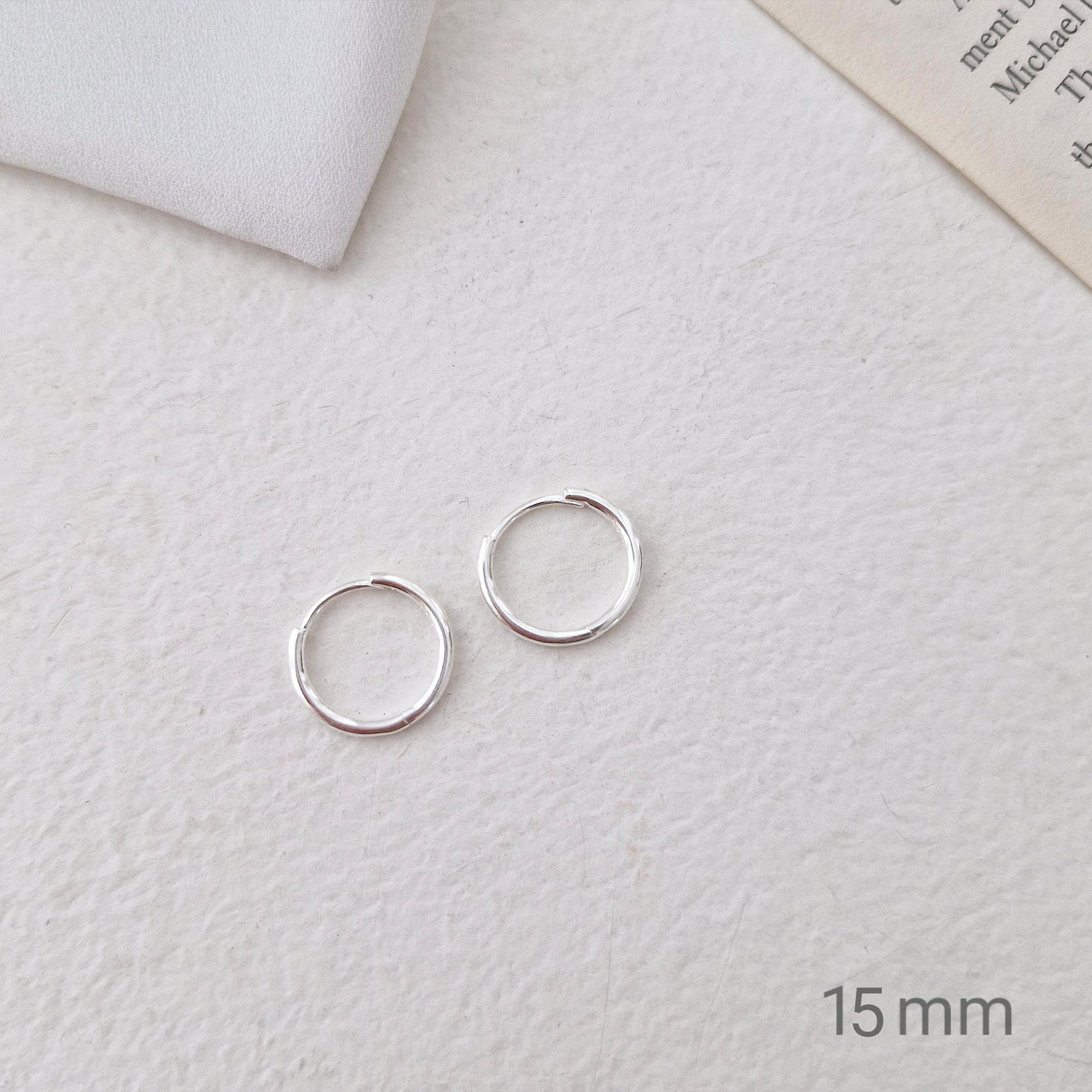 Sterling Silver 925 Earrings (10mm / 12mm / 15mm). dainty hoop huggie earring. modernist. Hinged clicker. 1.5mm hoop earrings.