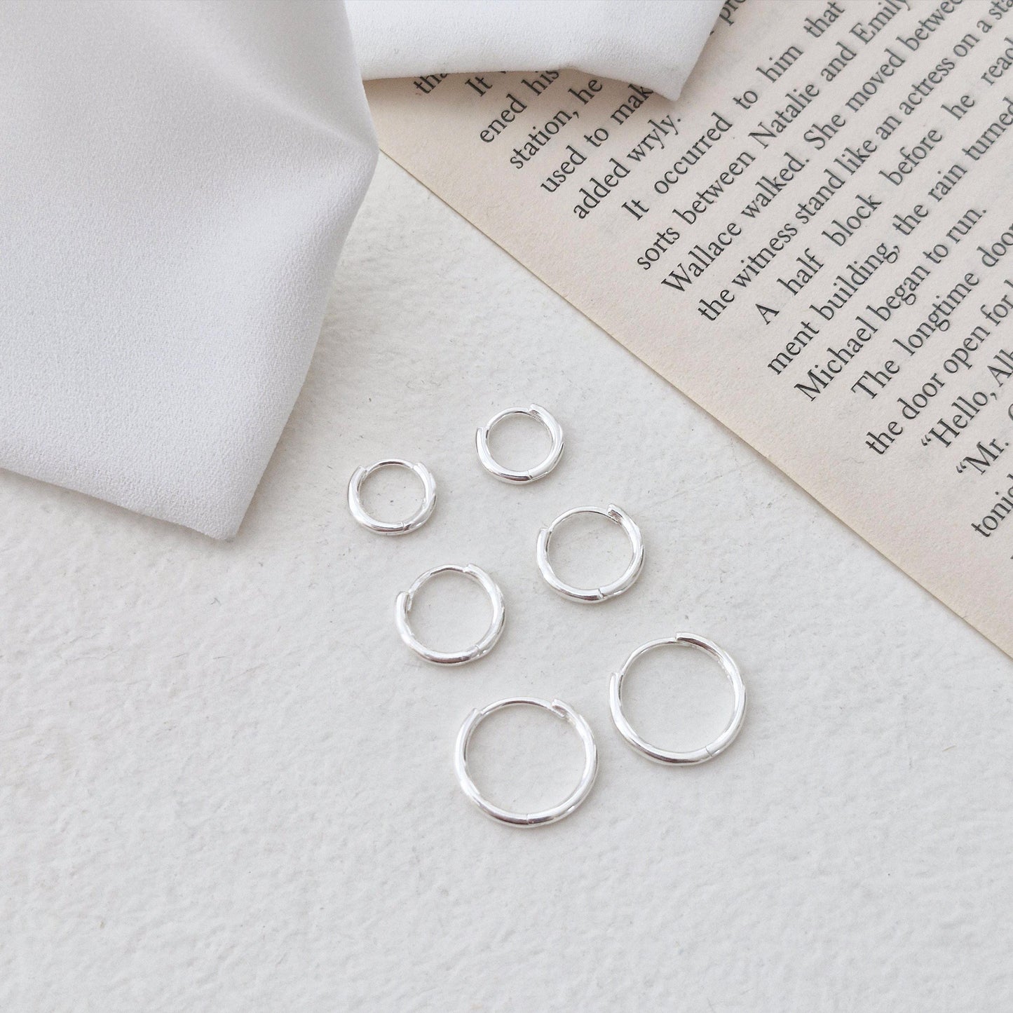 Sterling Silver 925 Earrings (10mm / 12mm / 15mm). dainty hoop huggie earring. modernist. Hinged clicker. 1.5mm hoop earrings.