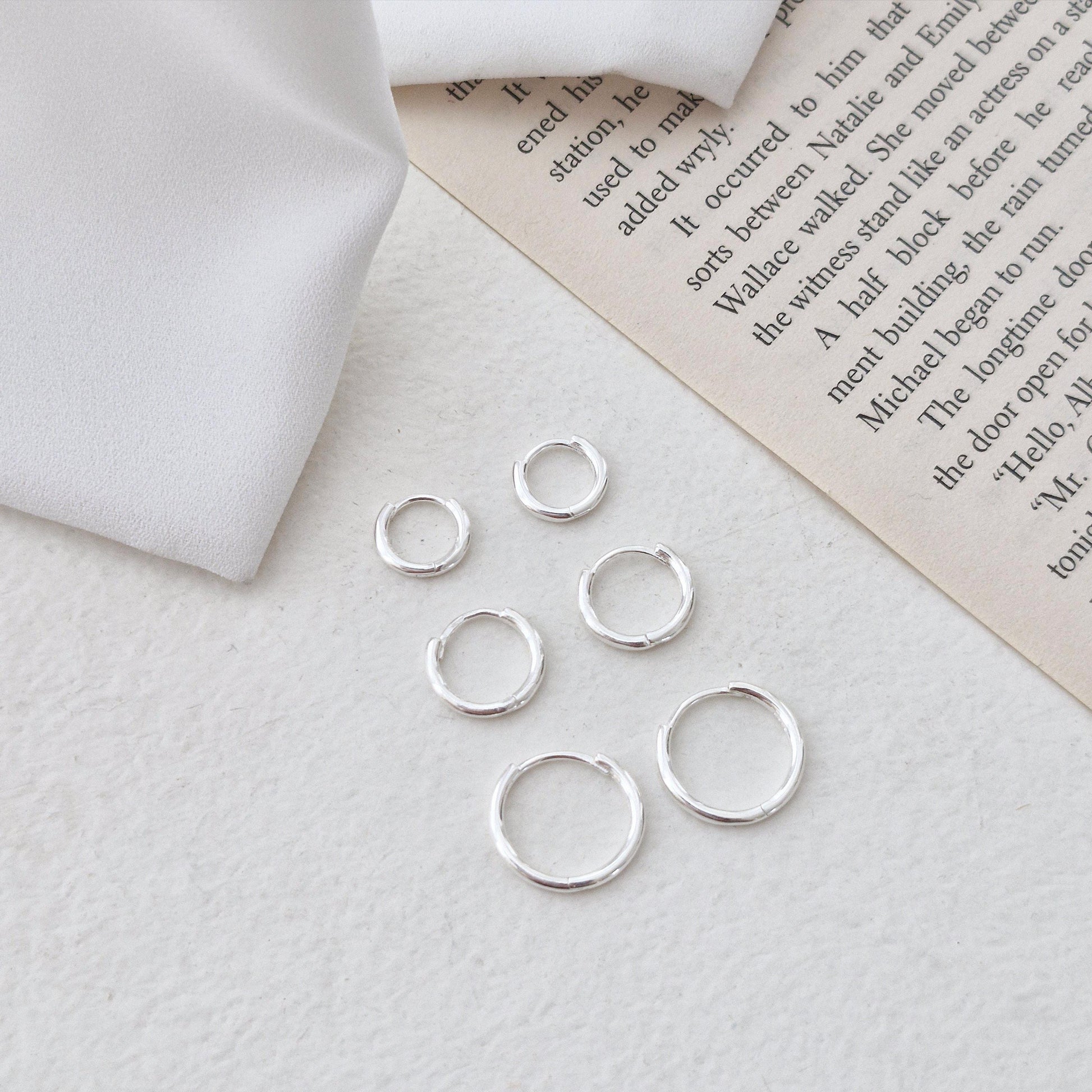 Sterling Silver 925 Earrings (10mm / 12mm / 15mm). dainty hoop huggie earring. modernist. Hinged clicker. 1.5mm hoop earrings.