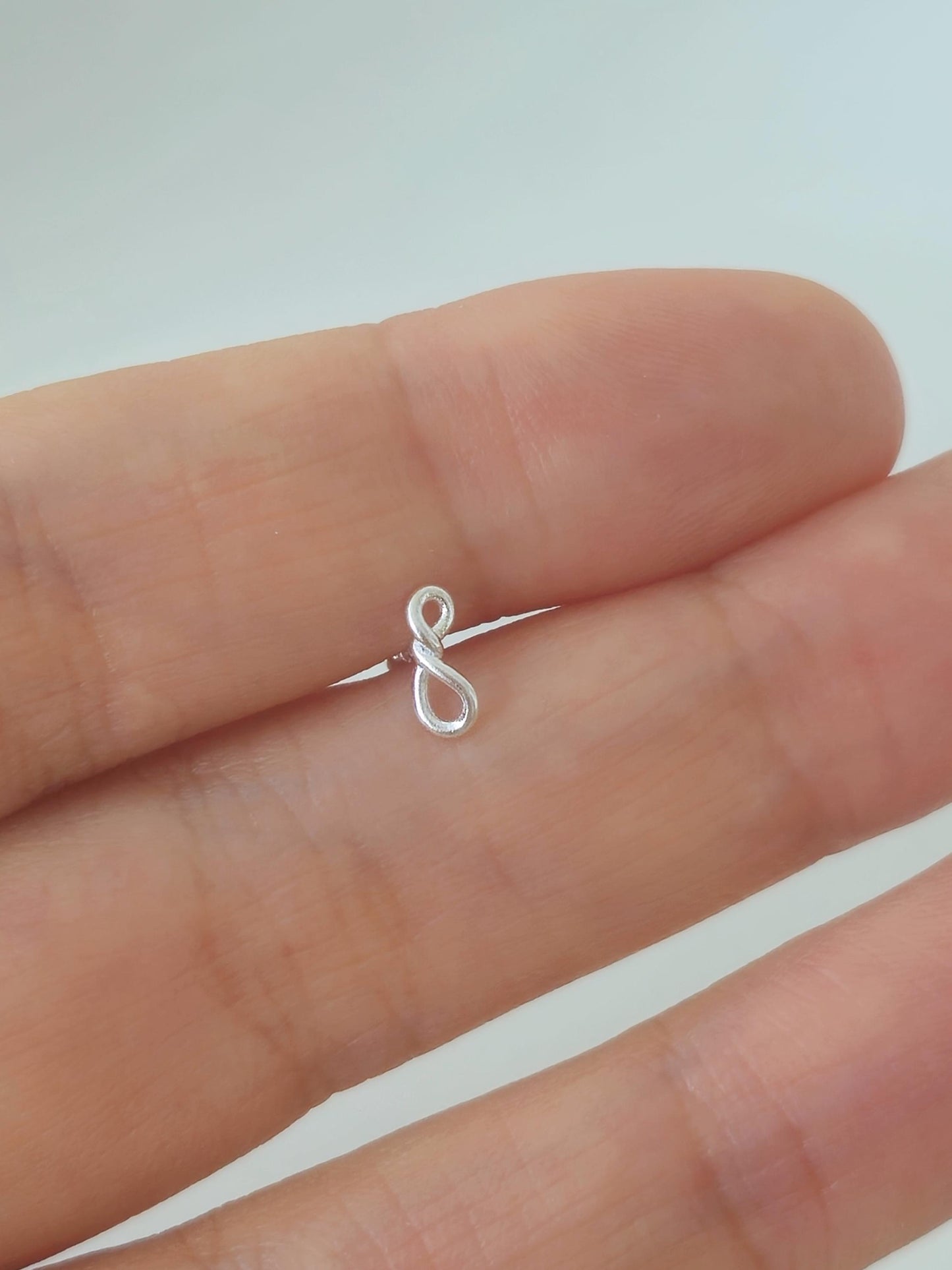 Sterling Silver Twisted Loop infinity Stud. Screw ball sterling silver piercing. Dainty.