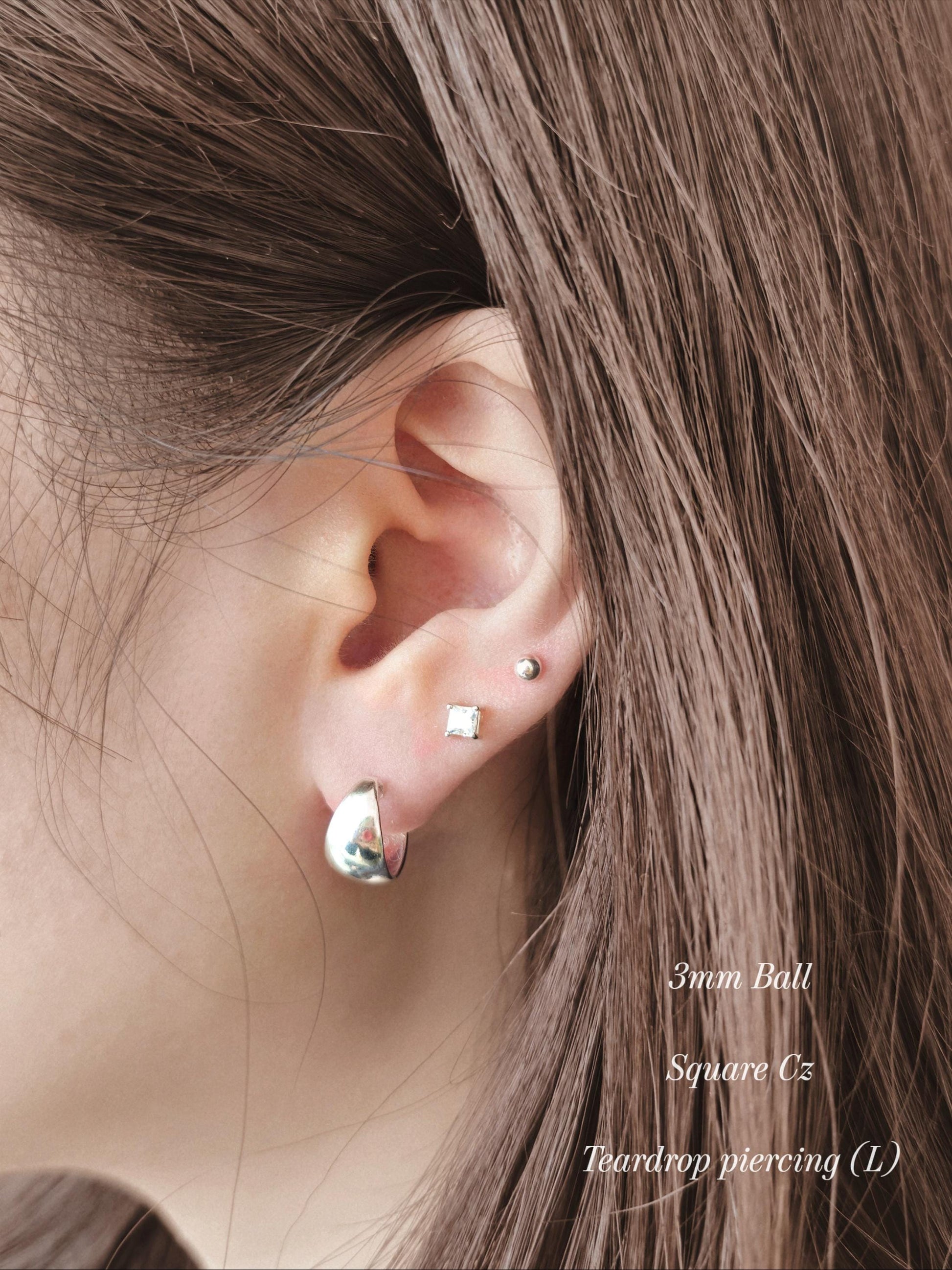 Sterling silver 925 teardrop huggie piercing. Silver Teardrop screwback. Domed huggie piercing.