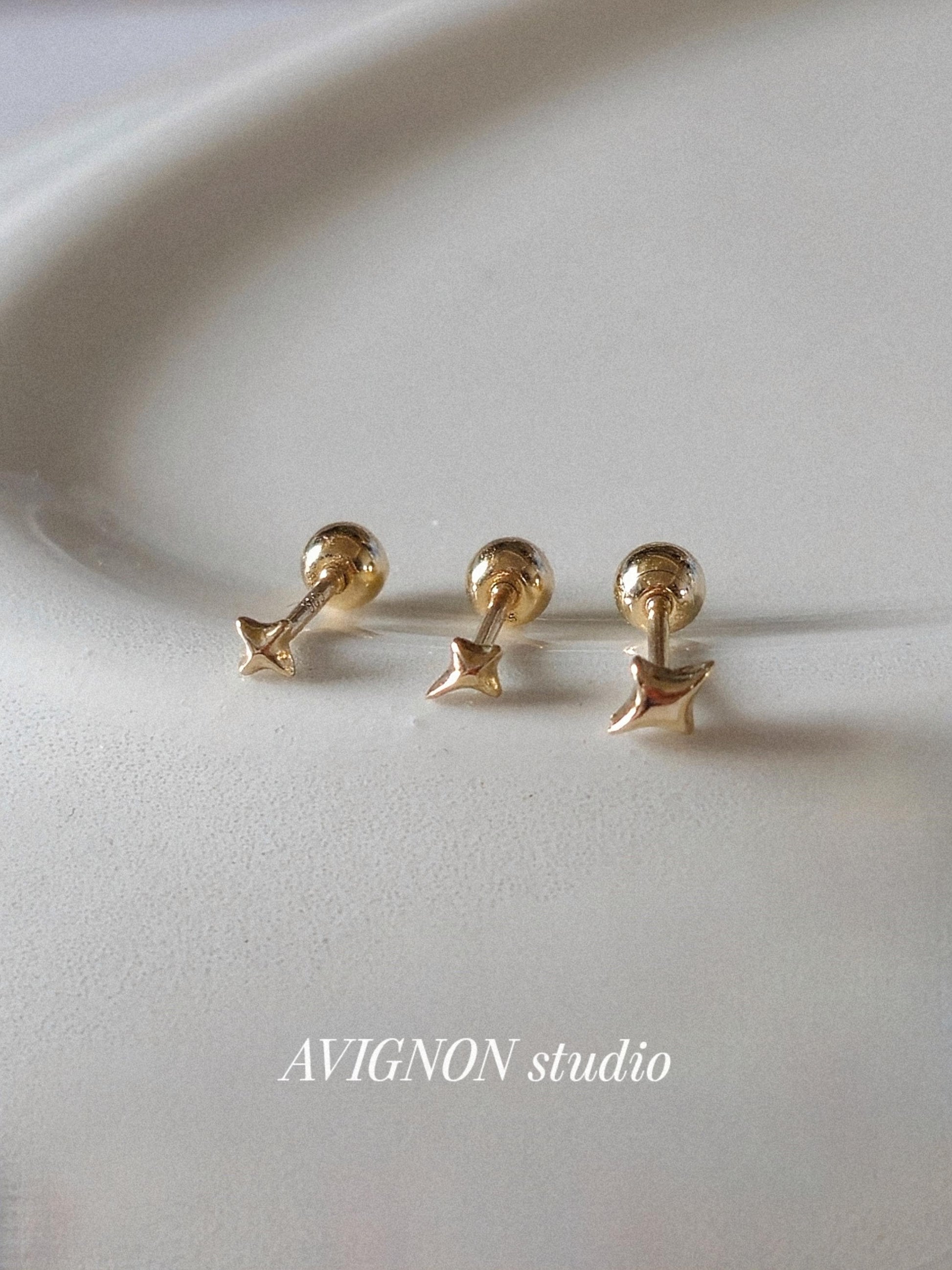 Tiny Star Stud piercing. solid gold 14k star screwball stud.