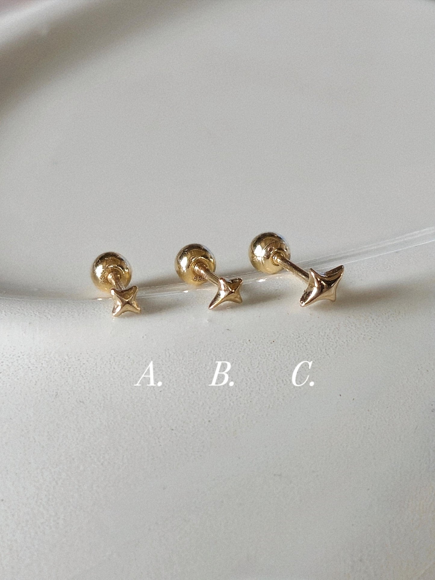 Tiny Star Stud piercing. solid gold 14k star screwball stud.