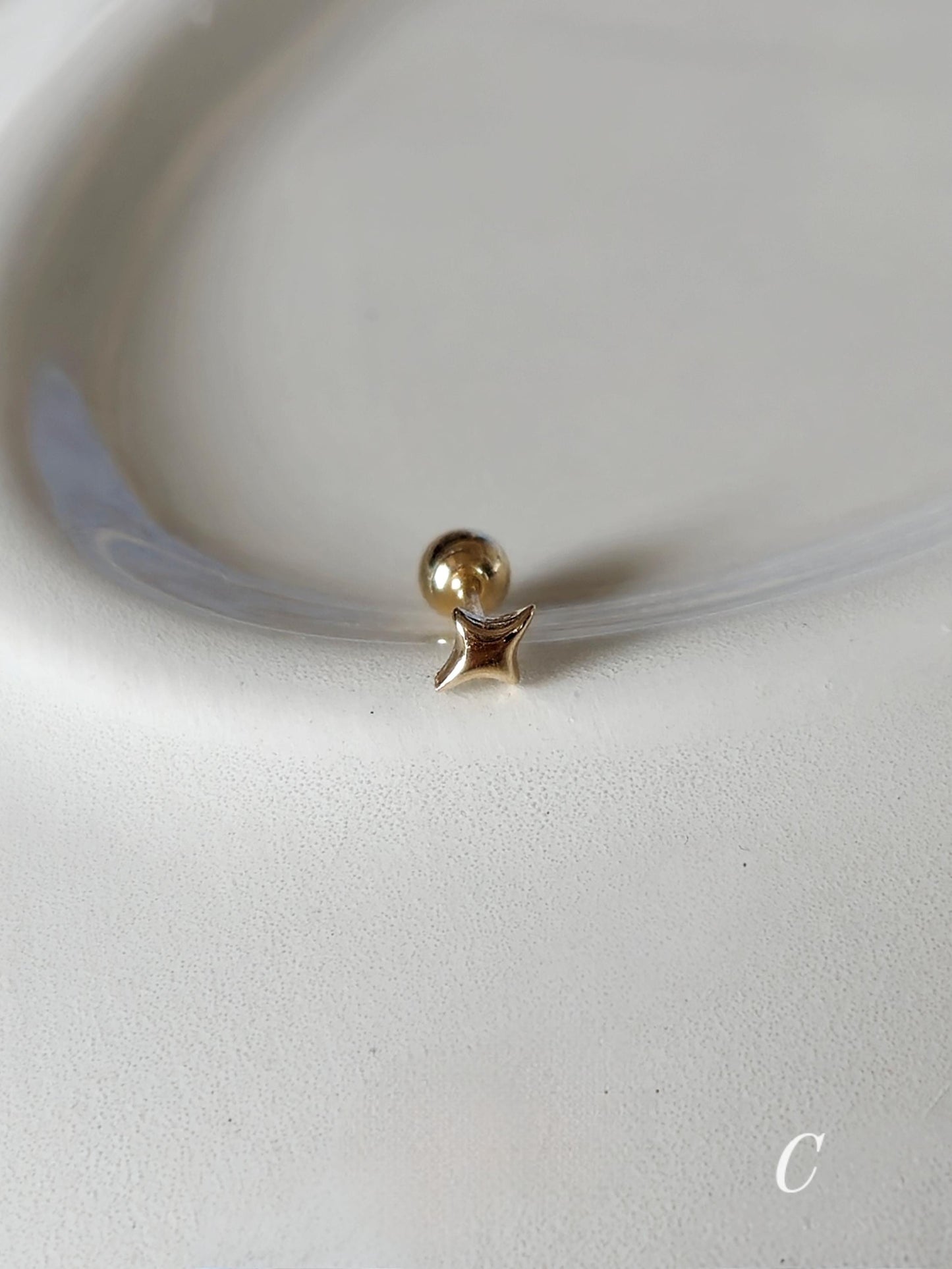Tiny Star Stud piercing. solid gold 14k star screwball stud.