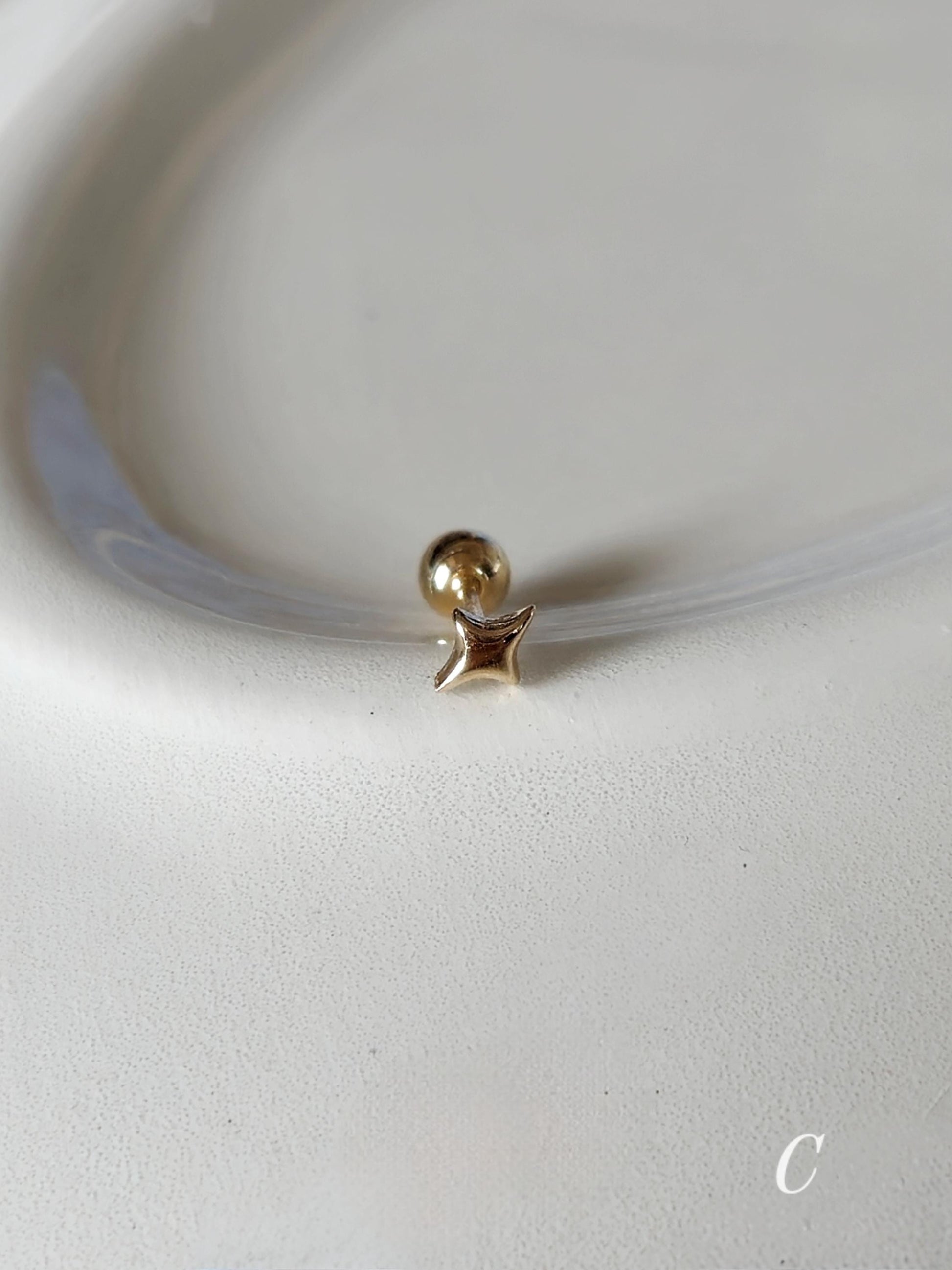 Tiny Star Stud piercing. solid gold 14k star screwball stud.