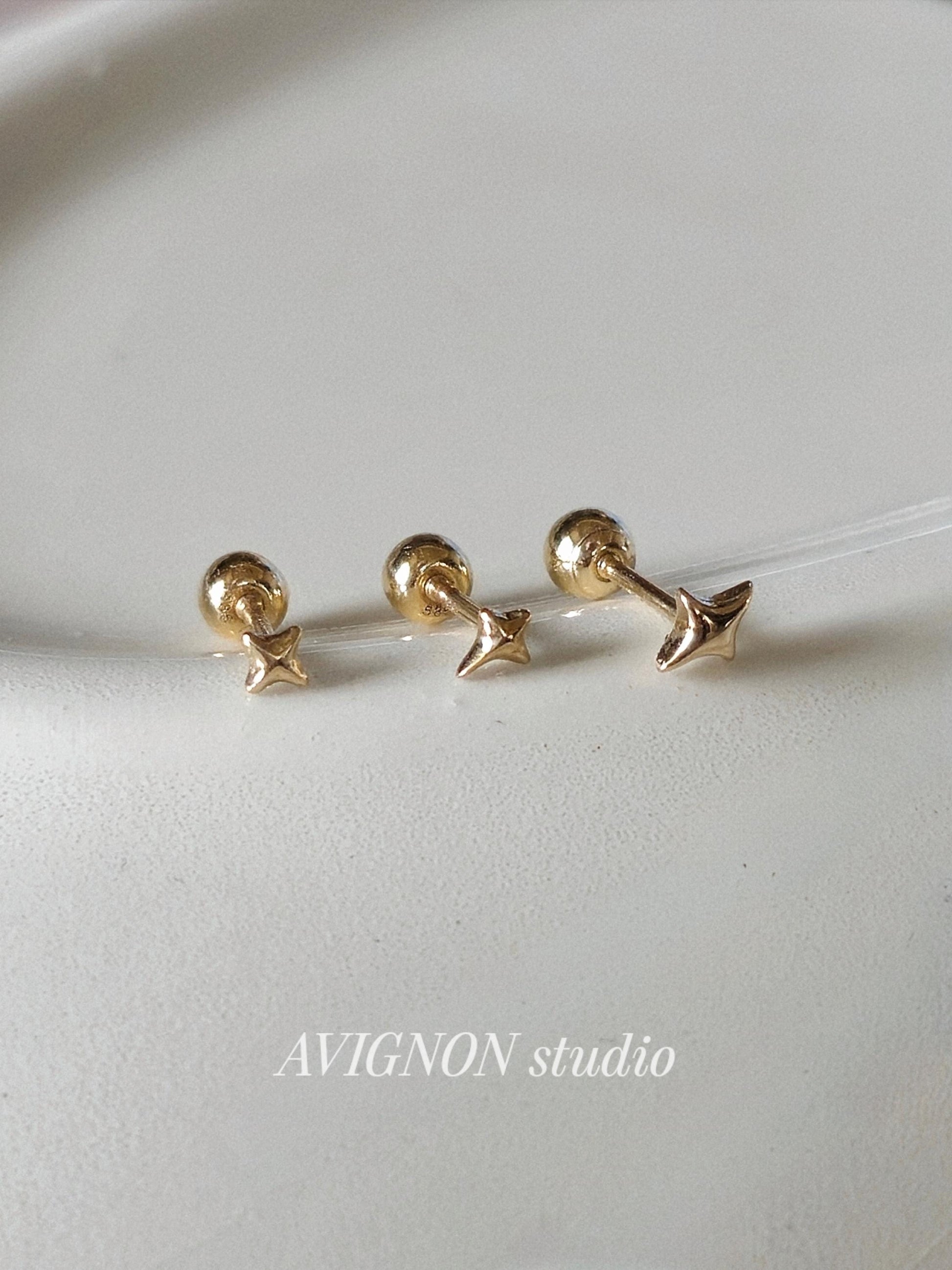 Tiny Star Stud piercing. solid gold 14k star screwball stud.