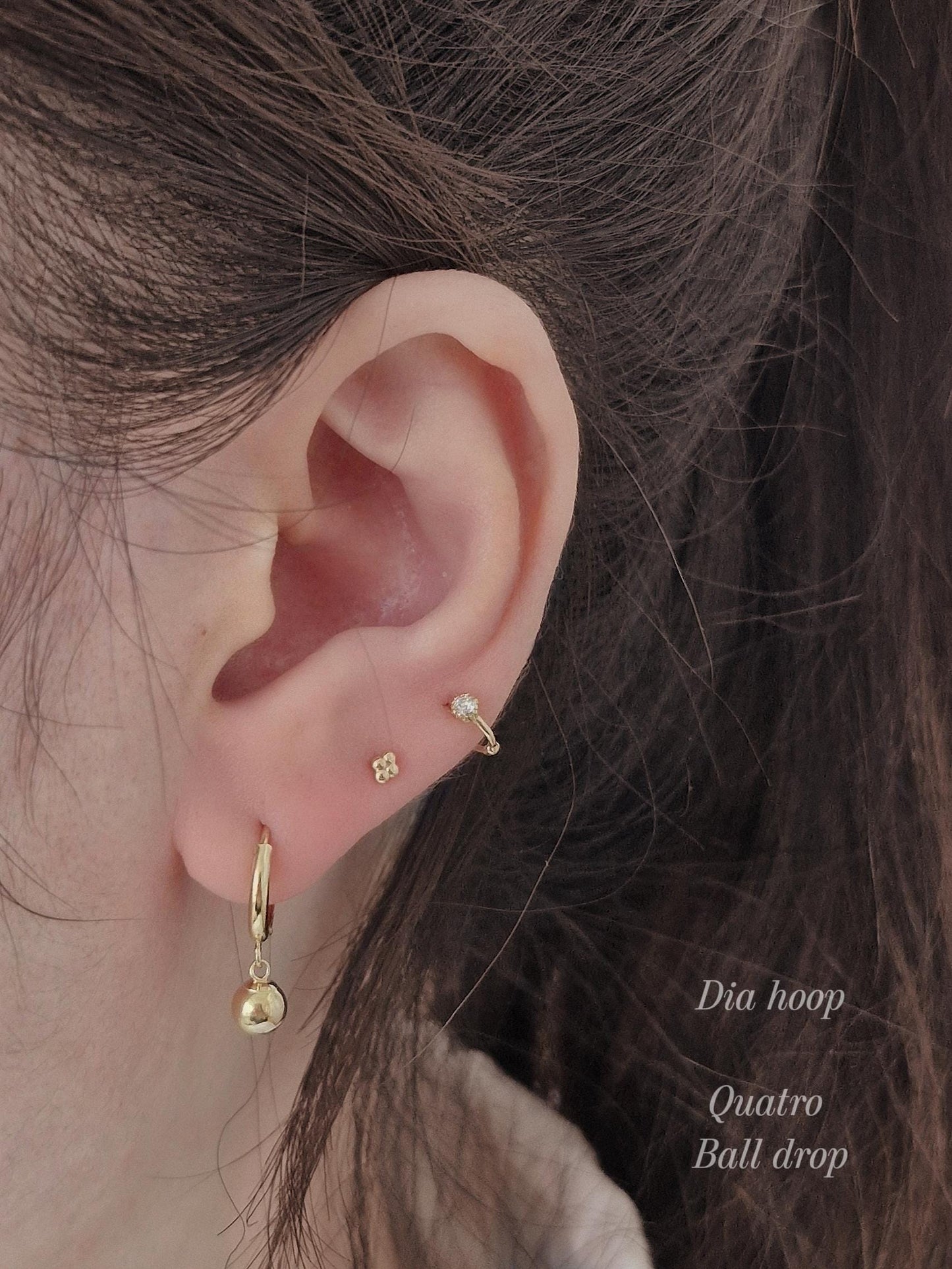 Tiny moisanite lab diamond 14k hoop earring.  solid gold hoop hinged clicker.