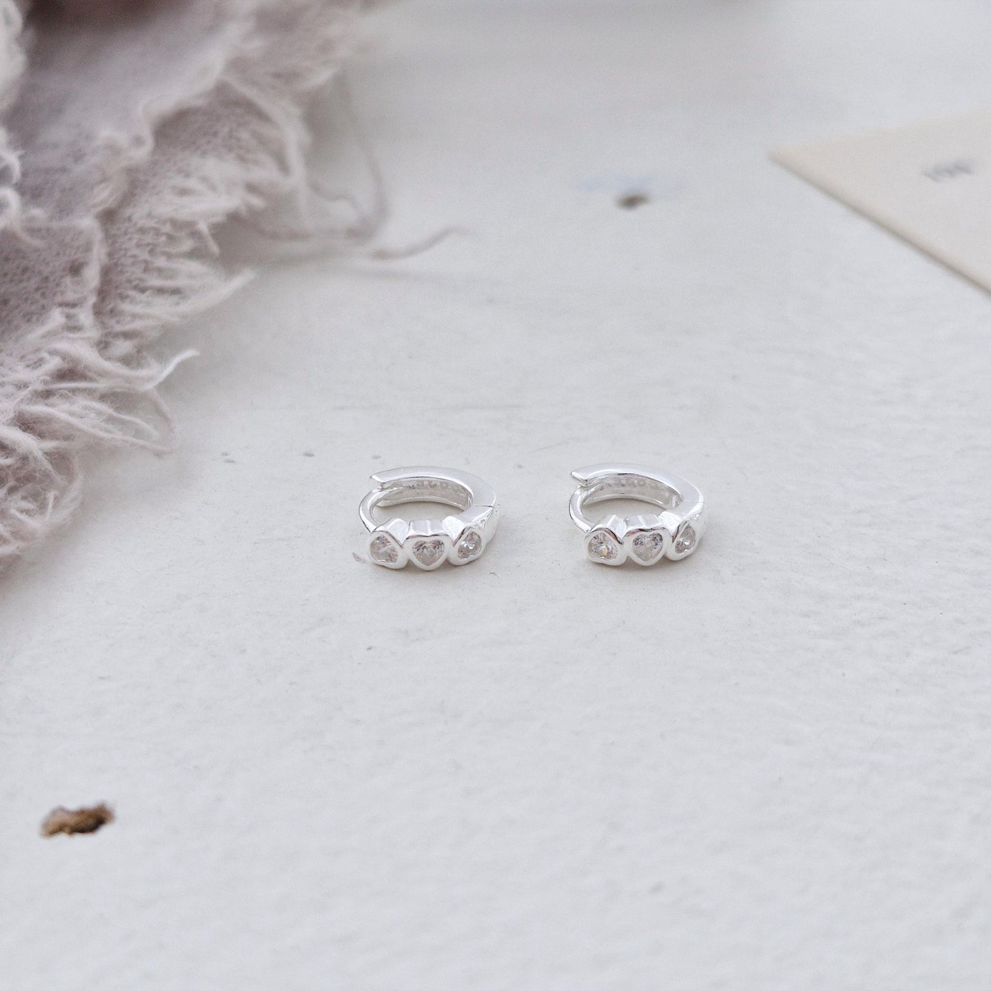 Triple Heart Huggie Earrings – Sterling Silver earring zirconia. Hinged CZ Clicker Hoop. clicker.