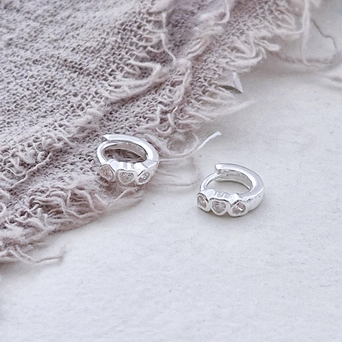 Triple Heart Huggie Earrings – Sterling Silver earring zirconia. Hinged CZ Clicker Hoop. clicker.