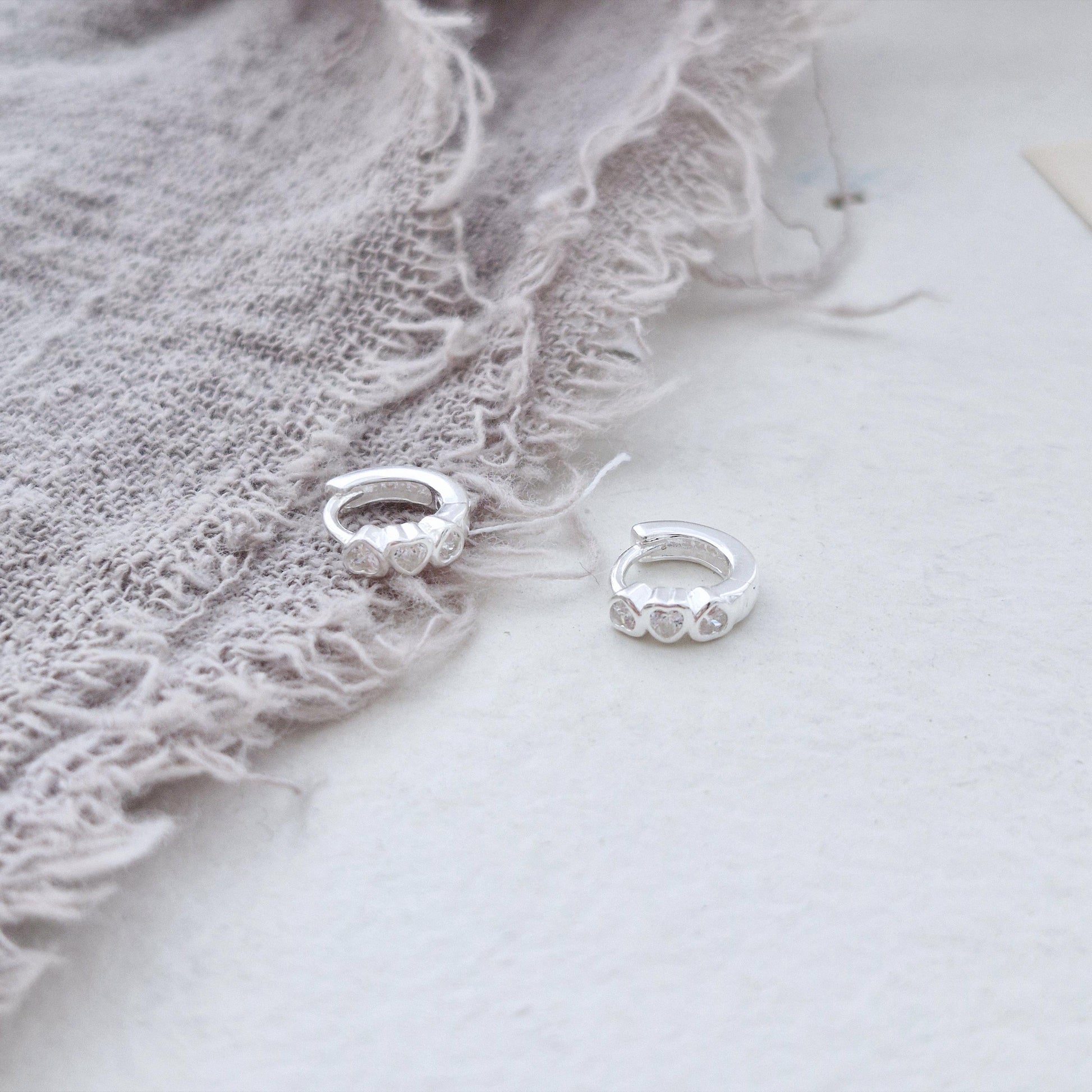 Triple Heart Huggie Earrings – Sterling Silver earring zirconia. Hinged CZ Clicker Hoop. clicker.
