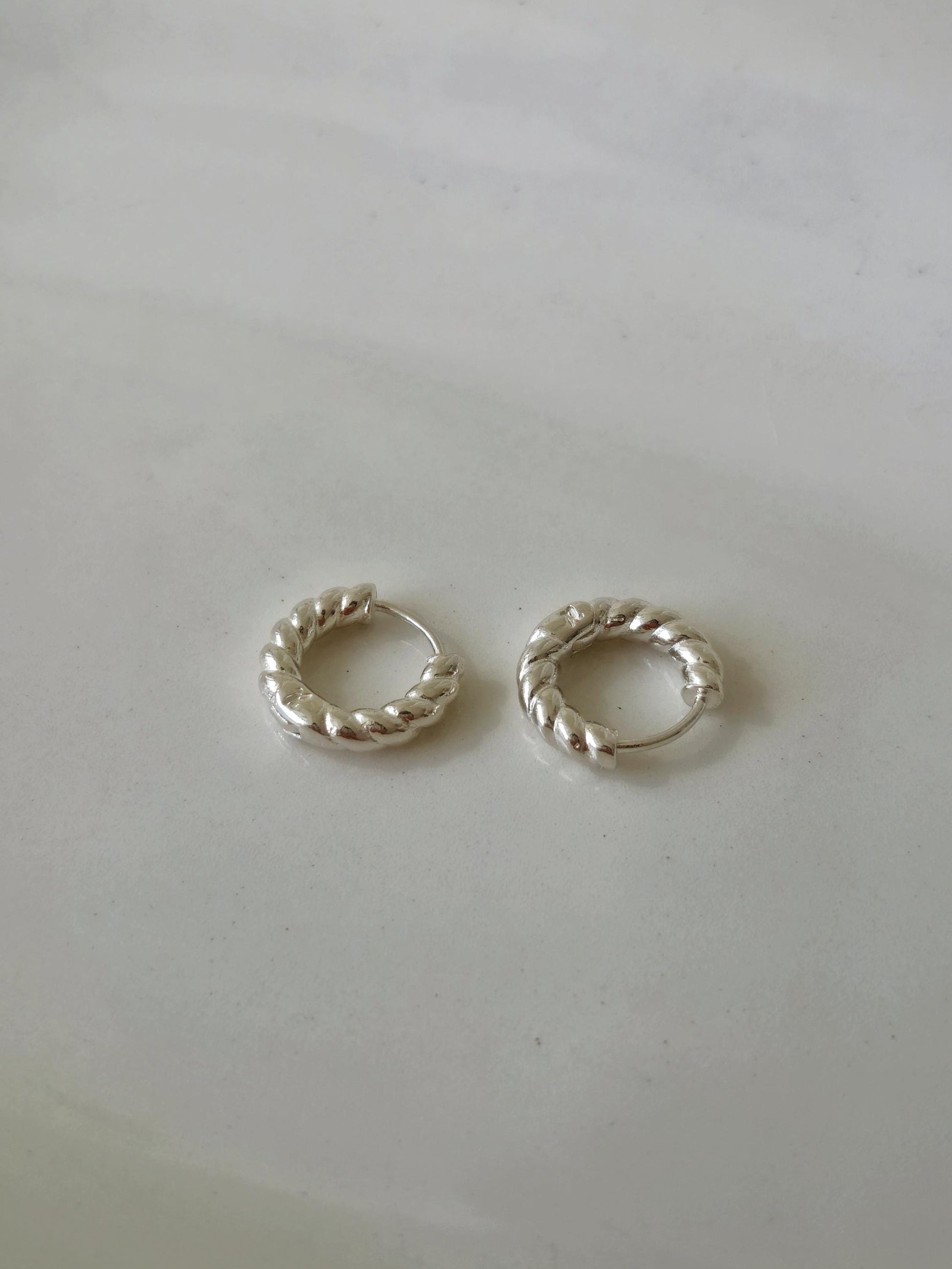 Twisted Hoop Earrings. Dainty sterling silver earrings. Twisted hinge Huggie.Croissant hoop earrings.
