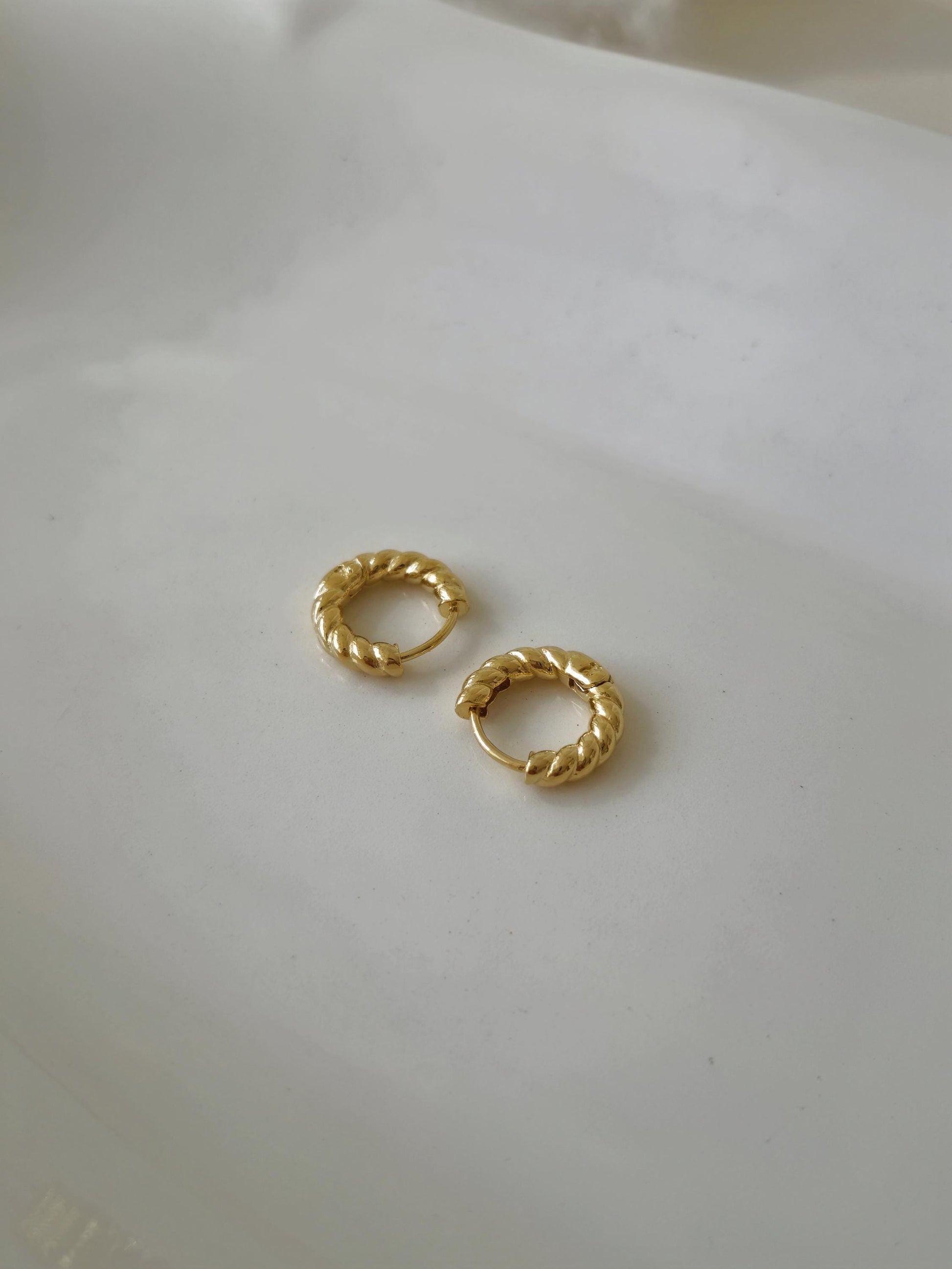 Twisted Hoop Earrings. Dainty sterling silver earrings. Twisted hinge Huggie.Croissant hoop earrings.