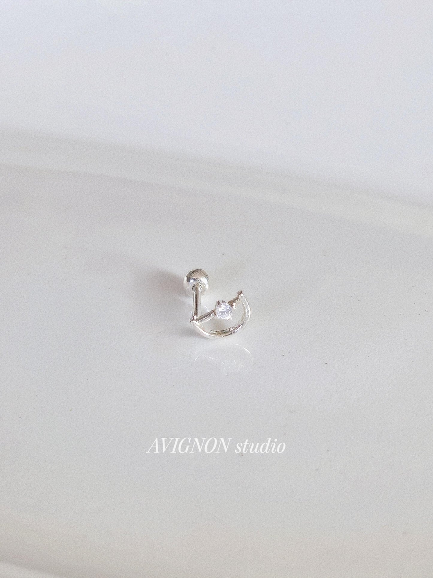 half moon cubic piercing. sterling silver 925 piercing.