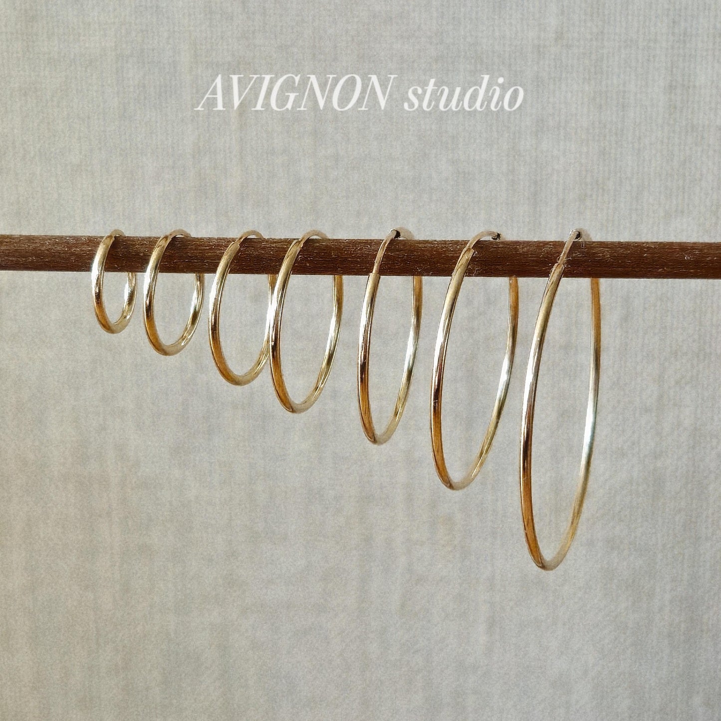 1.5mm gold filled hoop earring. lightweight pipe hoop earrings. endless hoop gold filled.