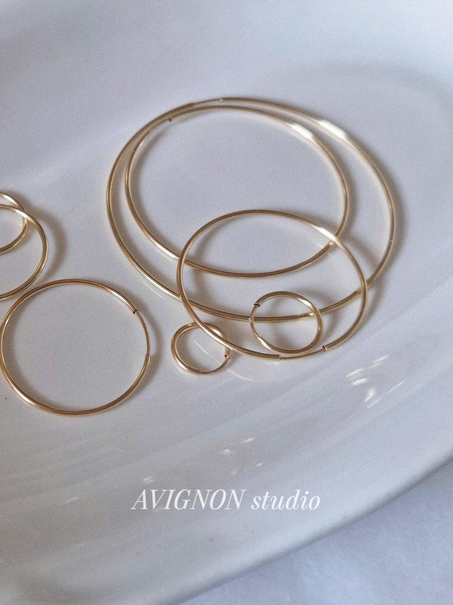 1.5mm gold filled hoop earring. lightweight pipe hoop earrings. endless hoop gold filled.