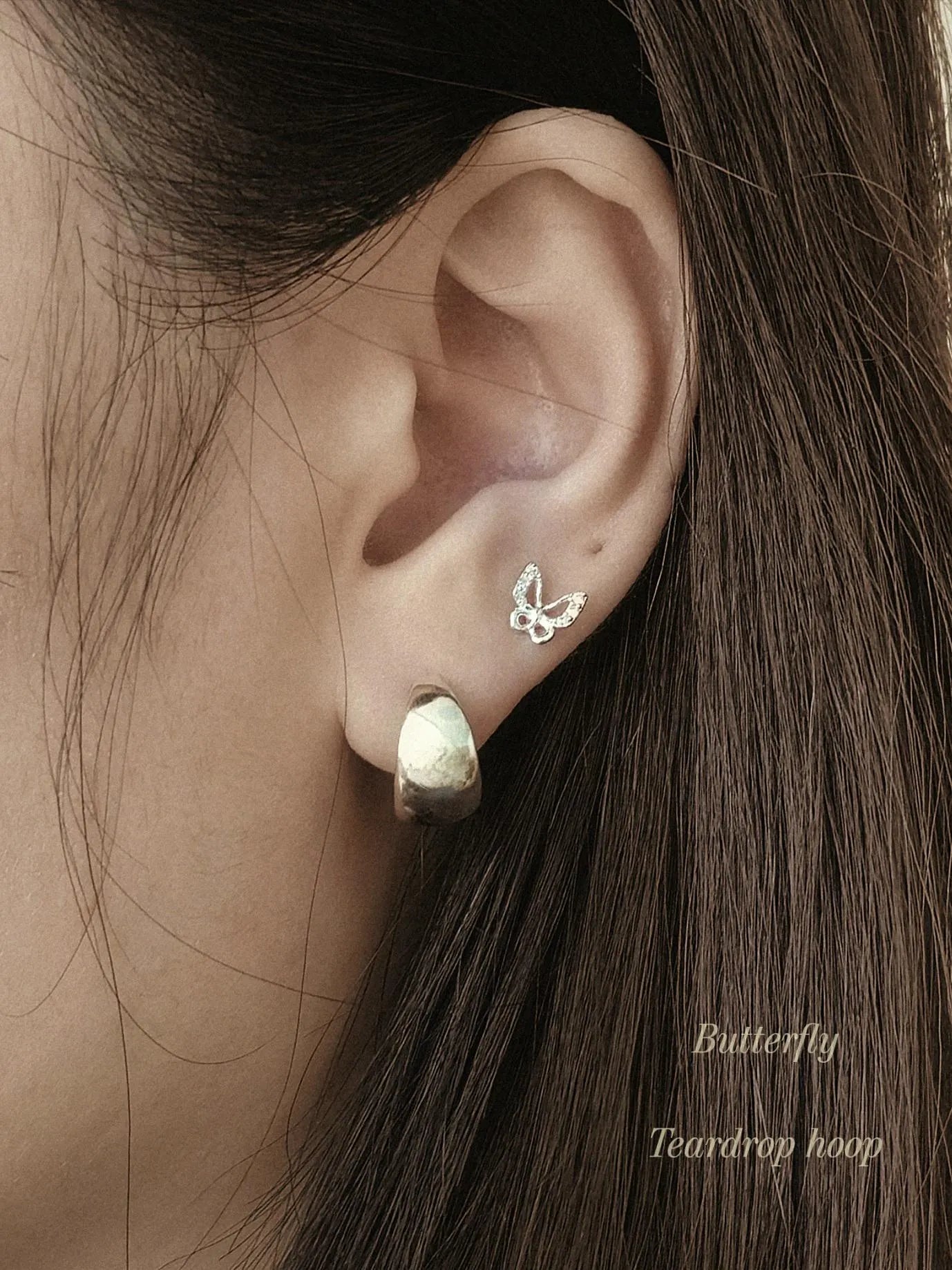 Sterling silver butterfly piercing. screwball stud.