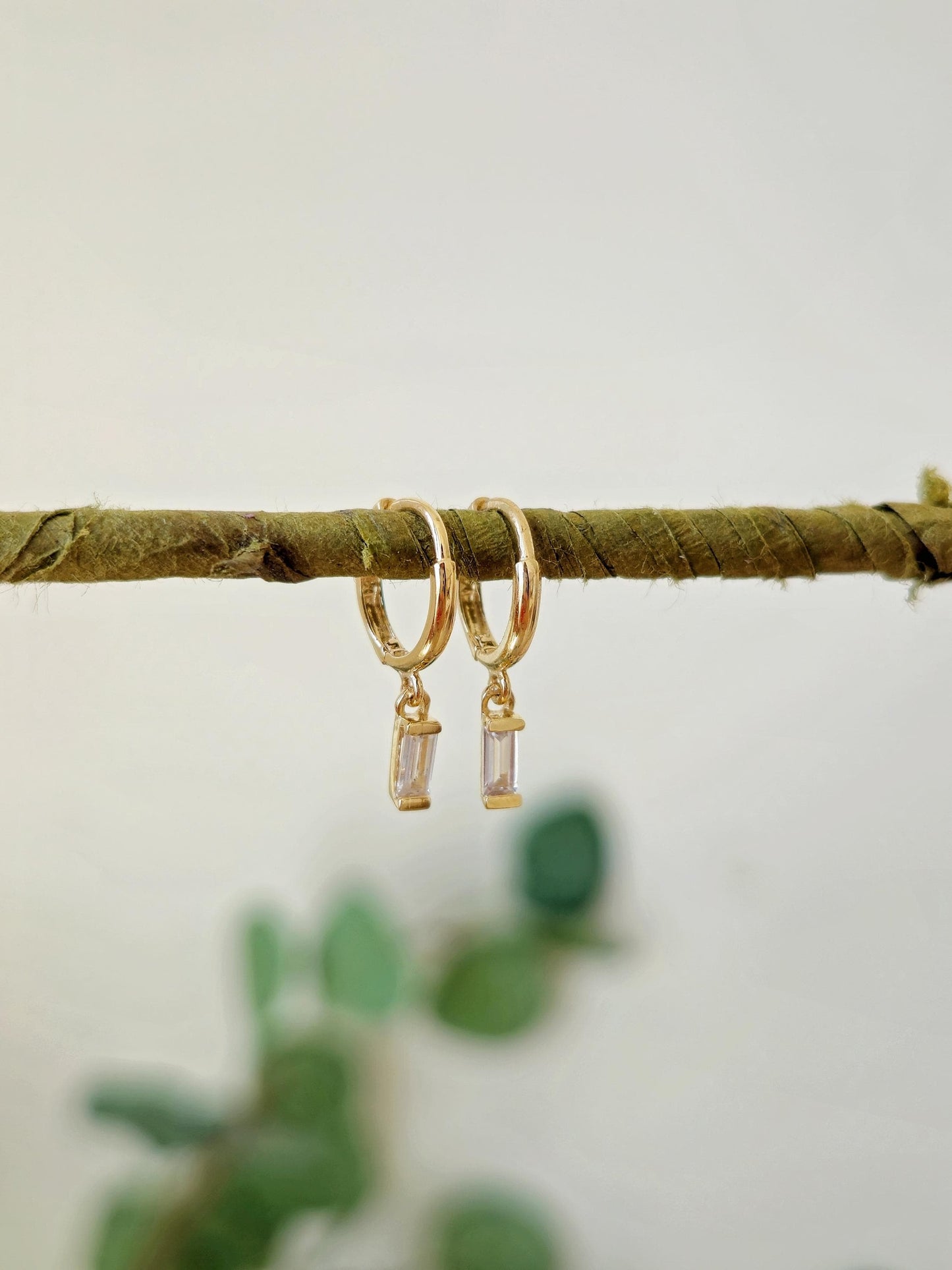 14k solid gold baguette cubic earrings. gold huggie earrings. Baguette drop earrings. Baguette dangle earrings.