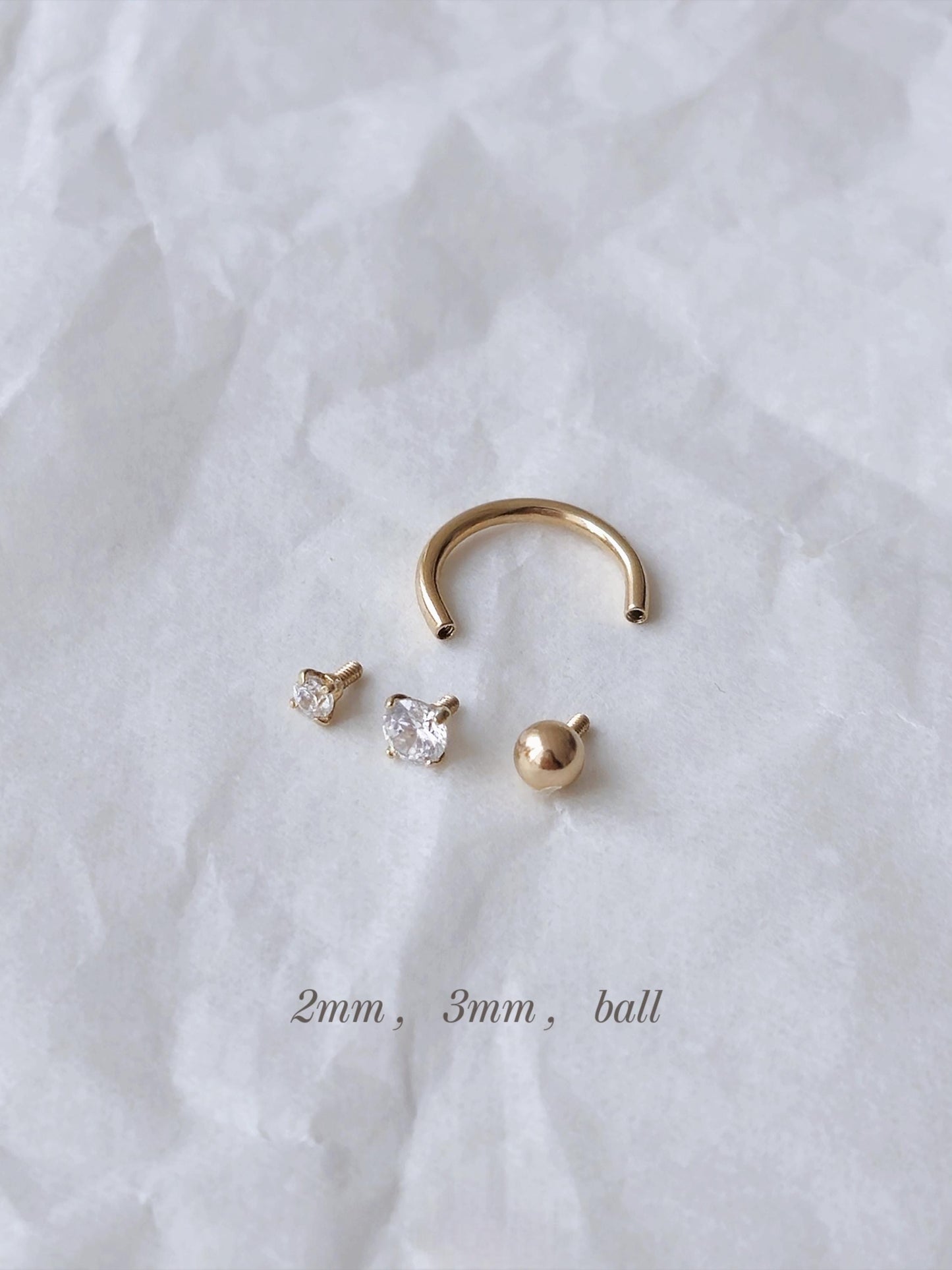14k solid gold curve tube piercing. 2mm 3mm cubic ball piercing. U-shaped hoop.