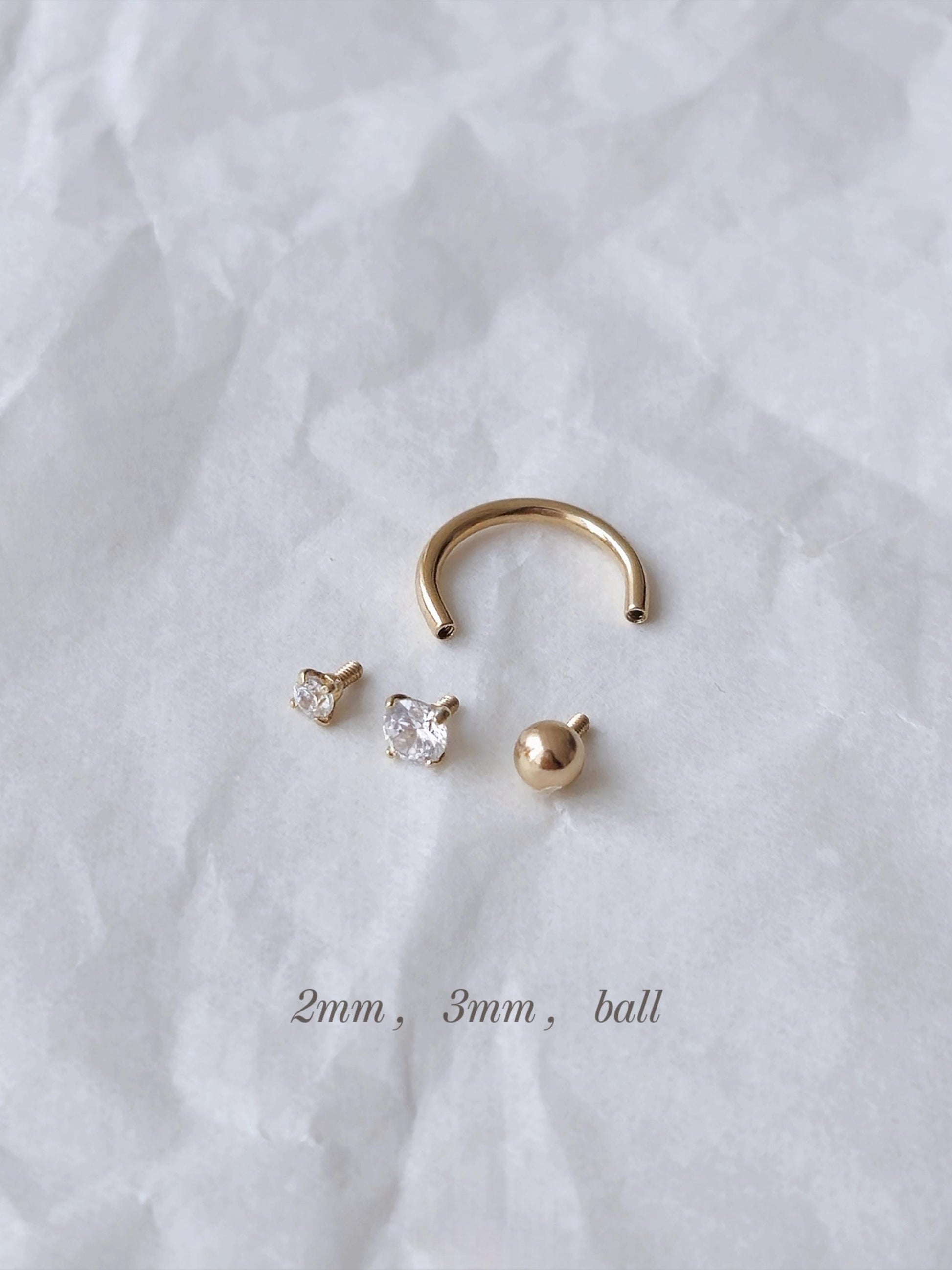 14k solid gold curve tube piercing. 2mm 3mm cubic ball piercing. U-shaped hoop.