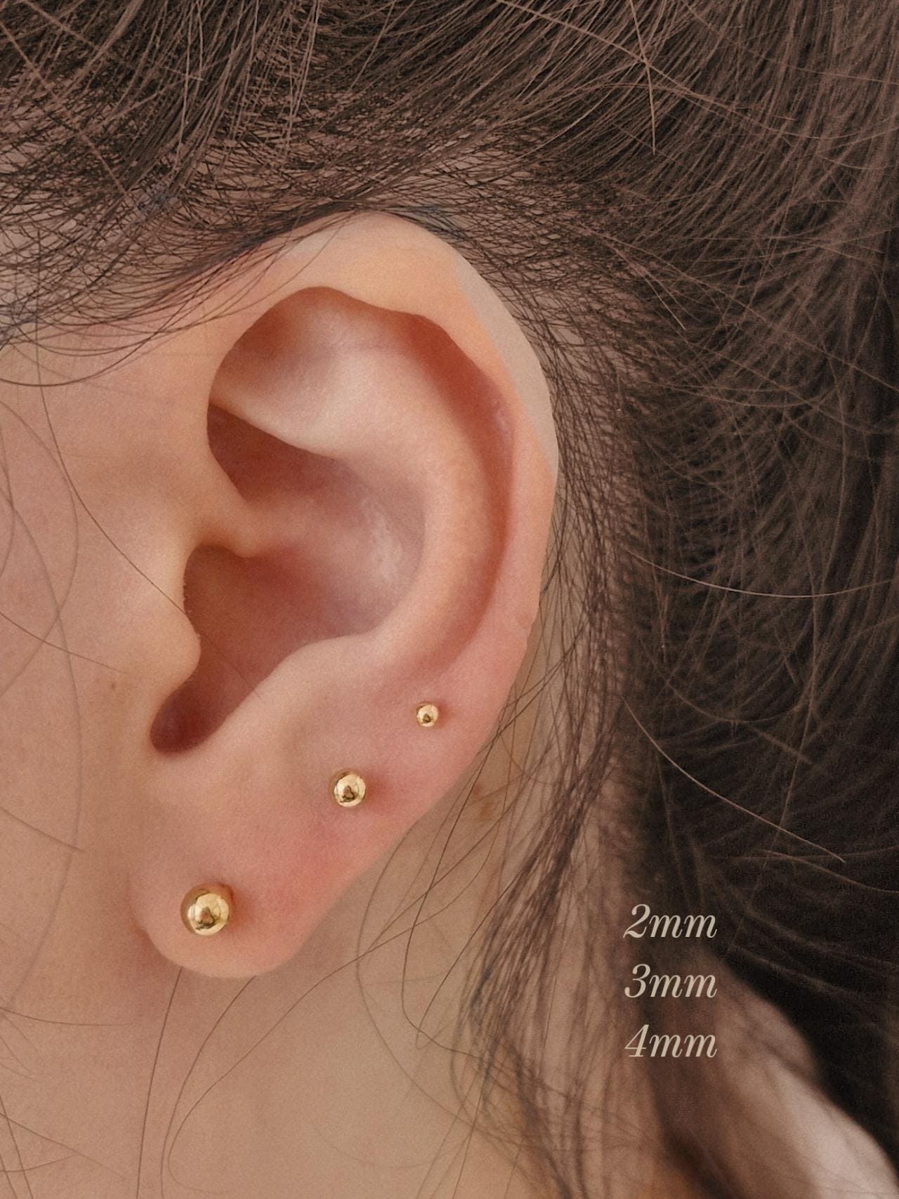14k solid gold labret piercing. ball labret piercing. flat screw back.