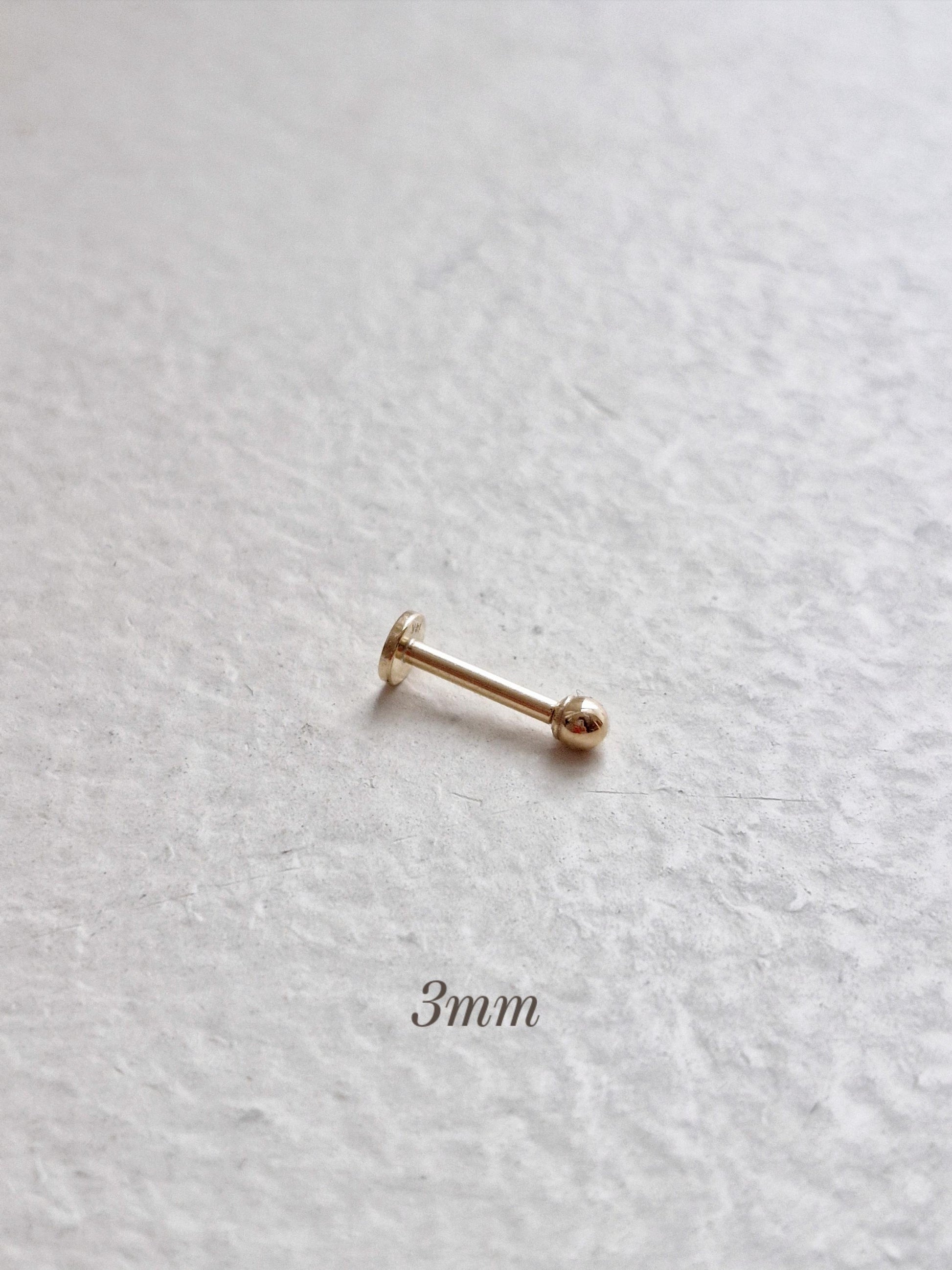 14k solid gold labret piercing. ball labret piercing. flat screw back.