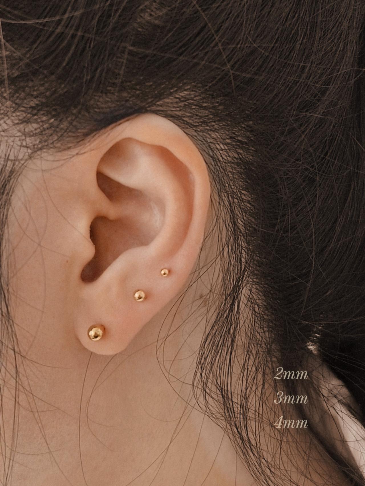 14k solid gold labret piercing. ball labret piercing. flat screw back.