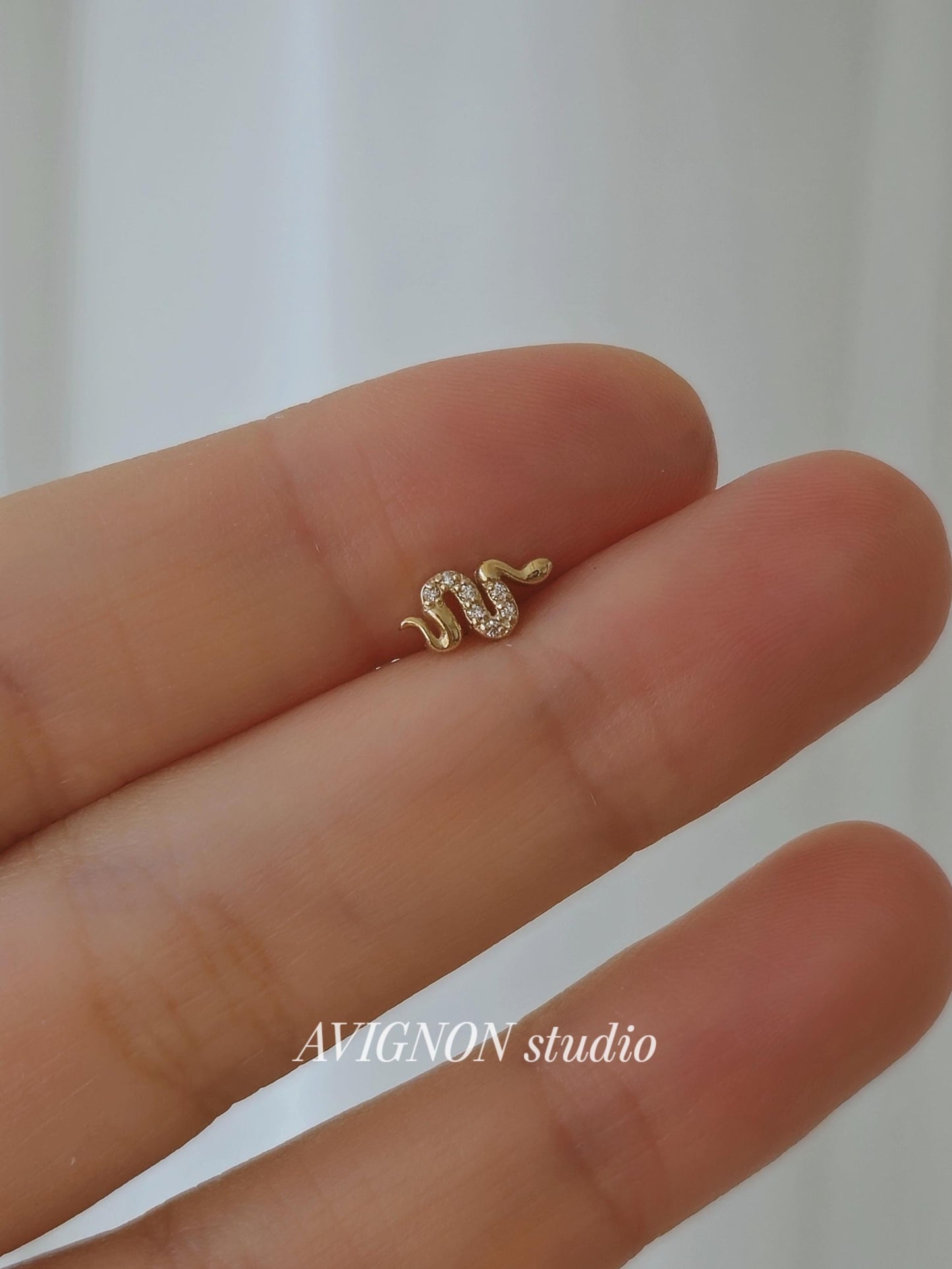 14k solid gold snake piercing. gold screw ball stud. snake stud. real gold.