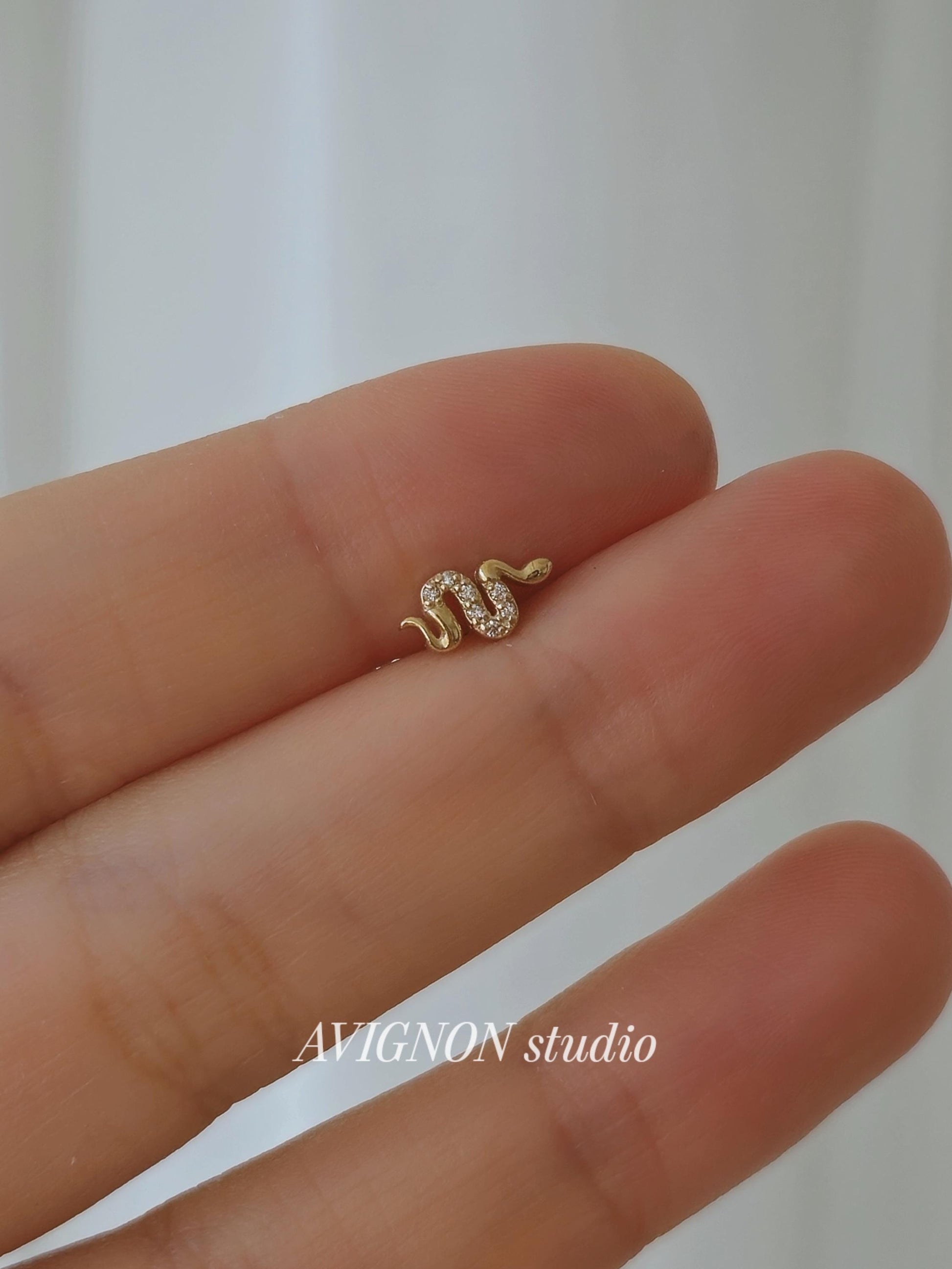 14k solid gold snake piercing. gold screw ball stud. snake stud. real gold.