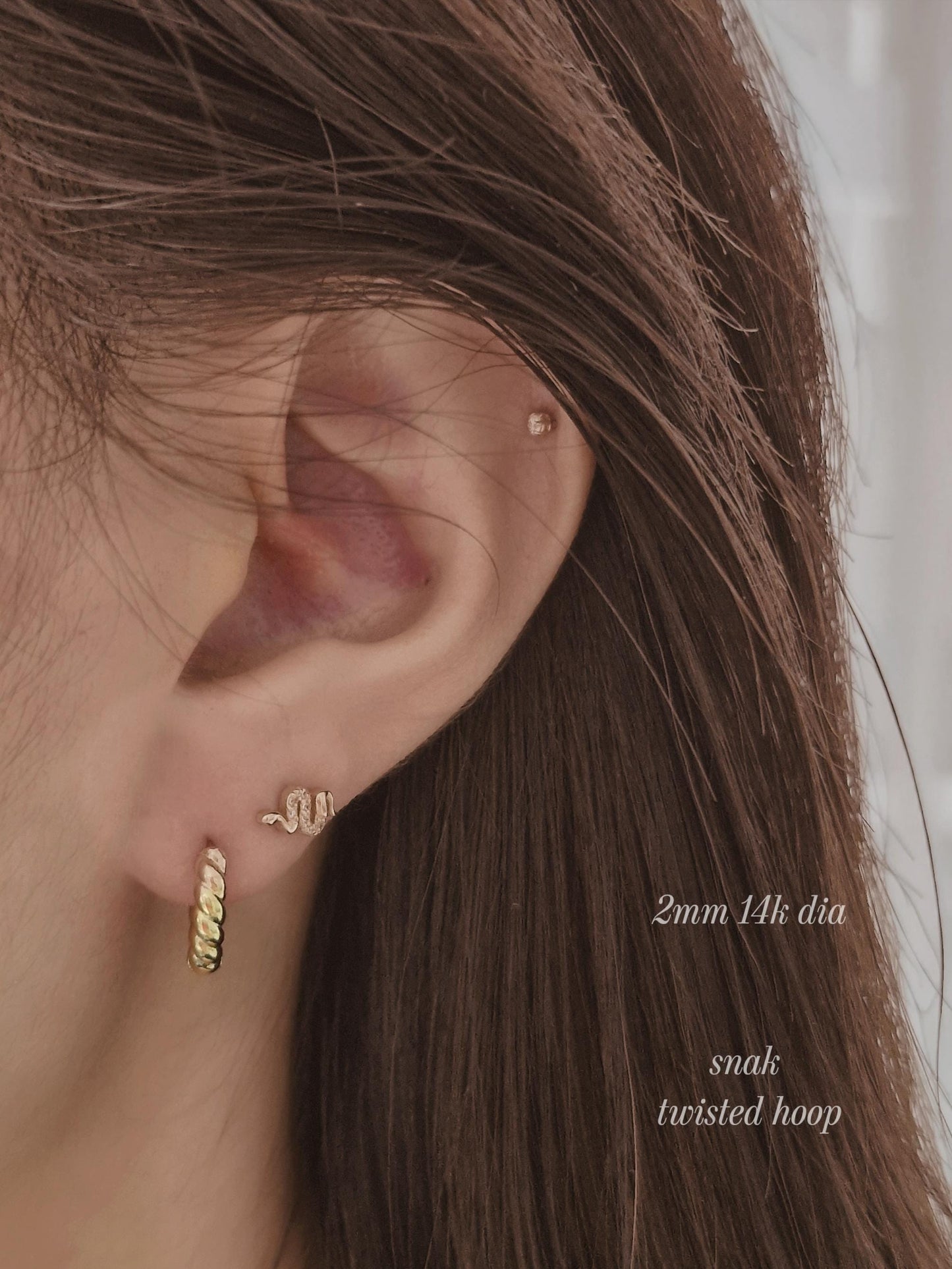 14k solid gold snake piercing. gold screw ball stud. snake stud. real gold.